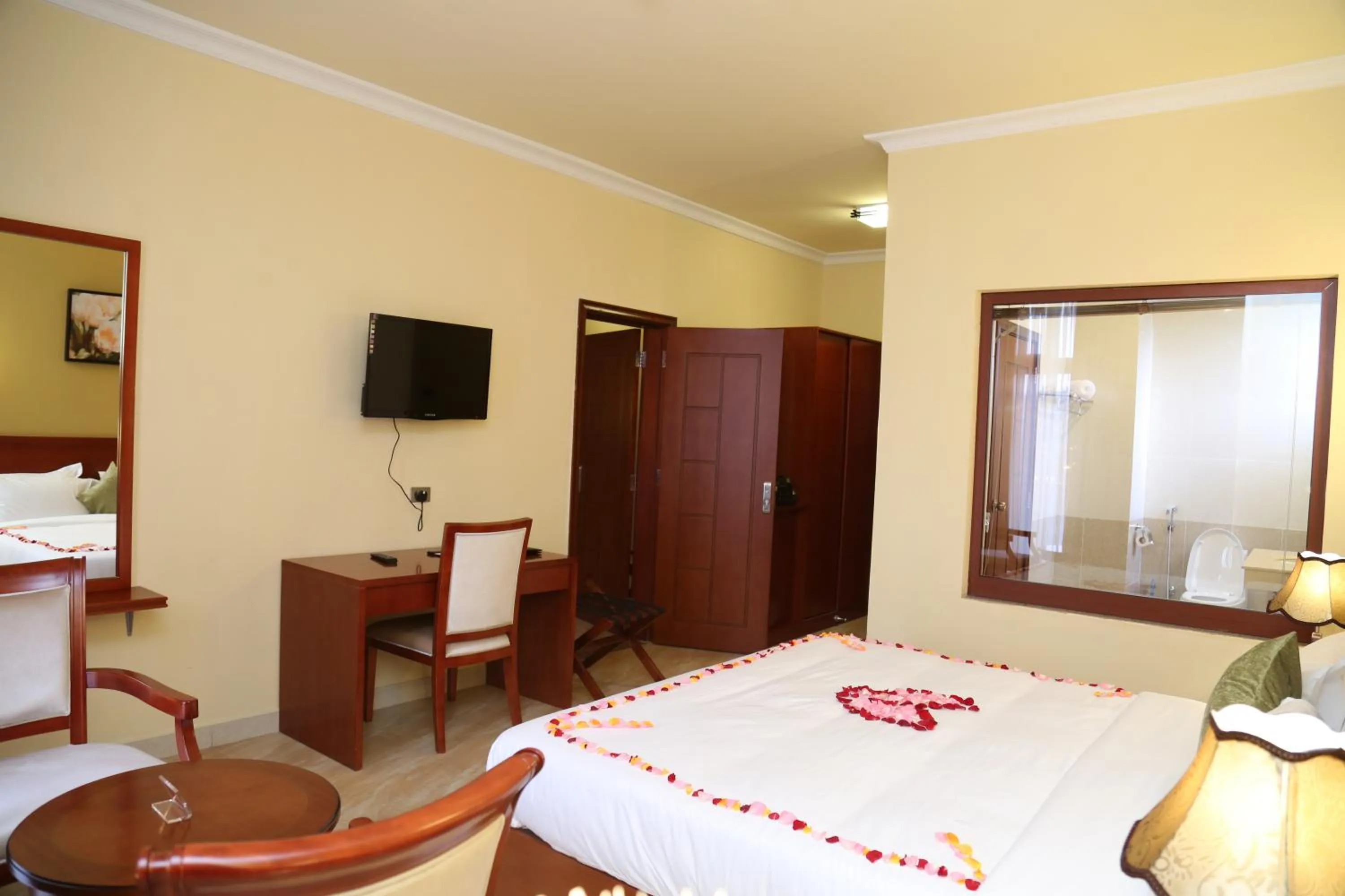 Photo of the whole room, Bed in Ye Afoli International Hotel
