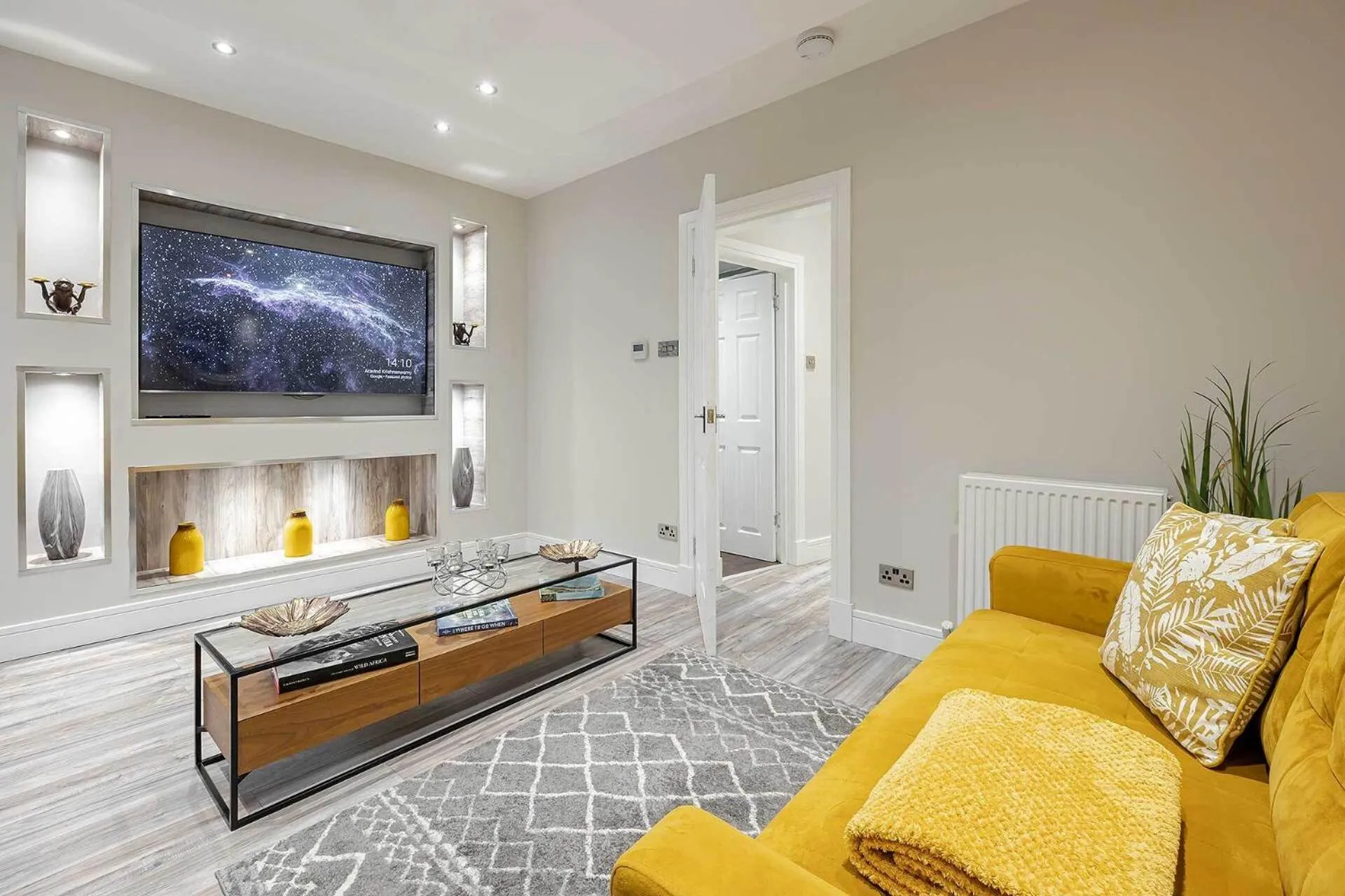 Living room, Bed in Carmel Apartments