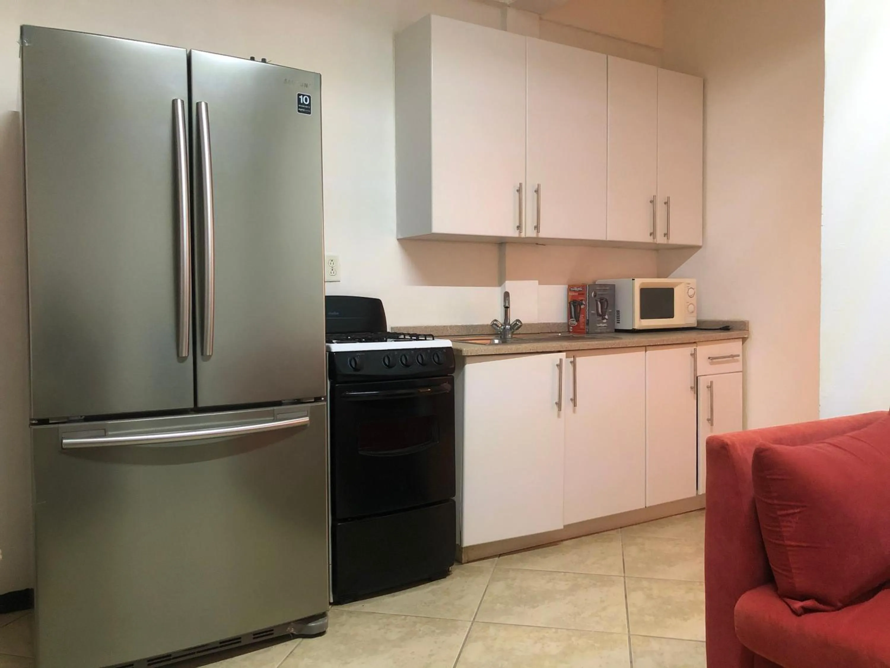 Kitchen or kitchenette in Hotel Bar Restaurant Emergency 911 STO LK GROUP