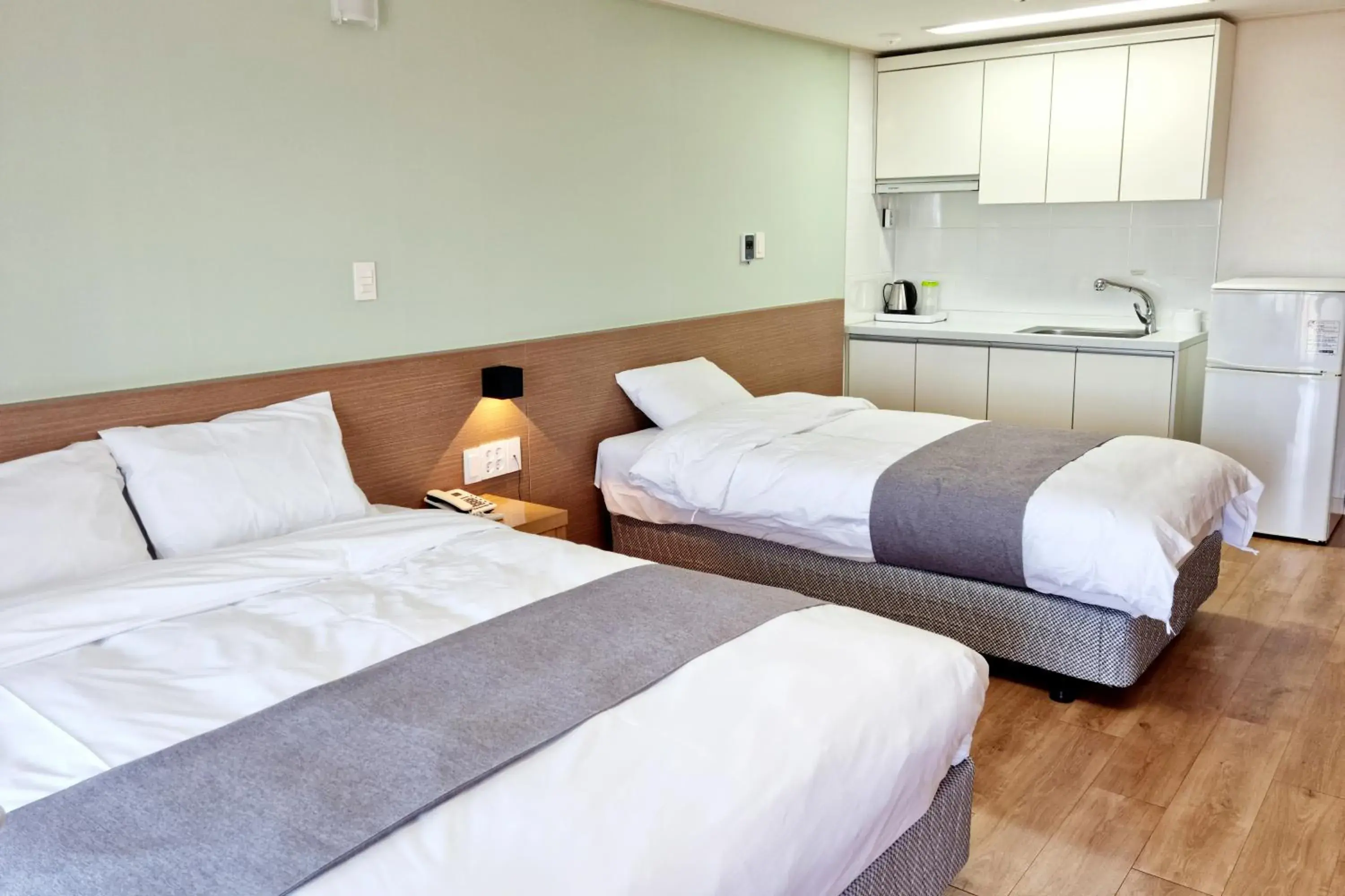 Bed in Hi Jeju Hotel Bed in Hi Jeju Hotel