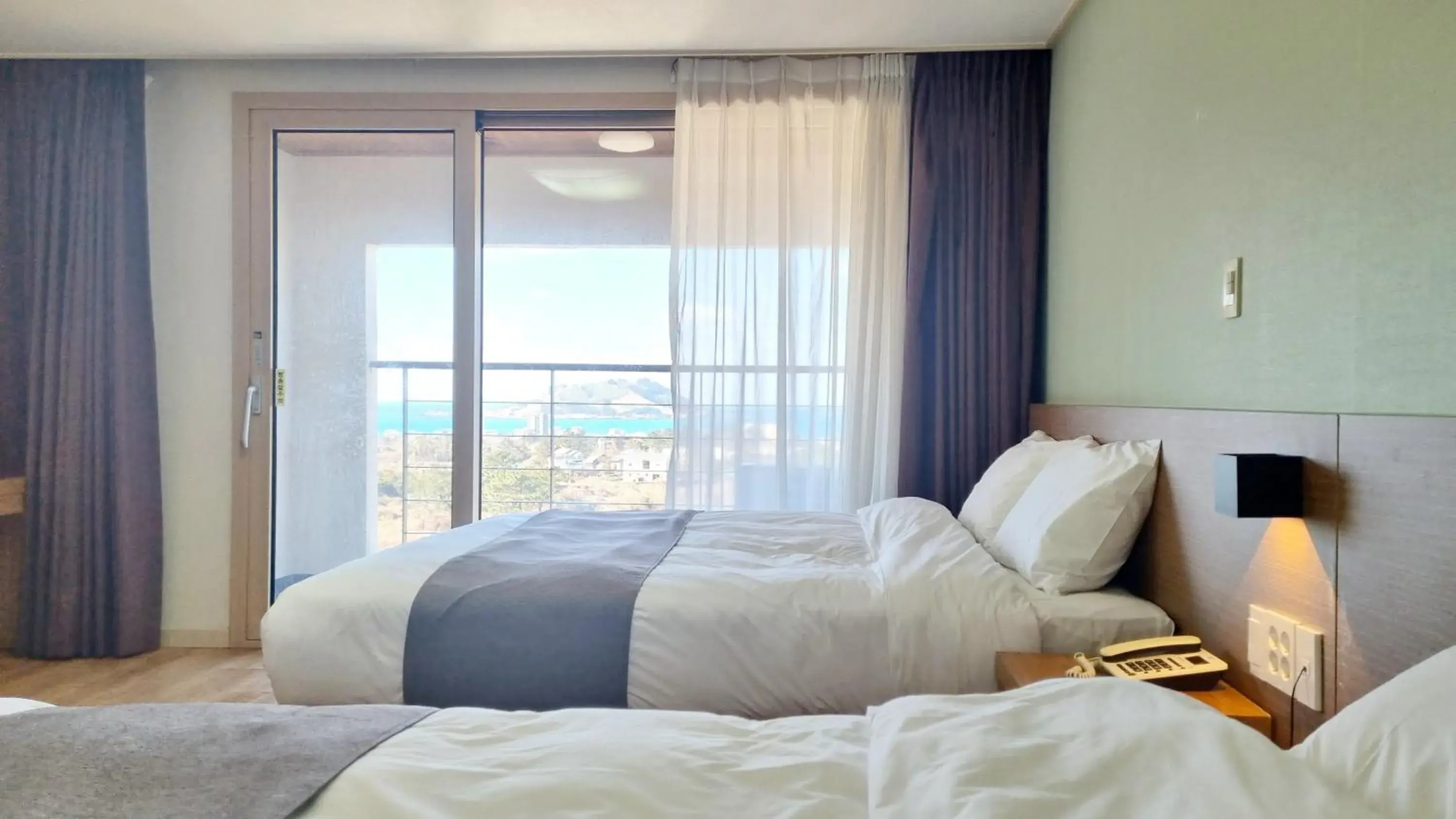 Bed in Hi Jeju Hotel Bed in Hi Jeju Hotel