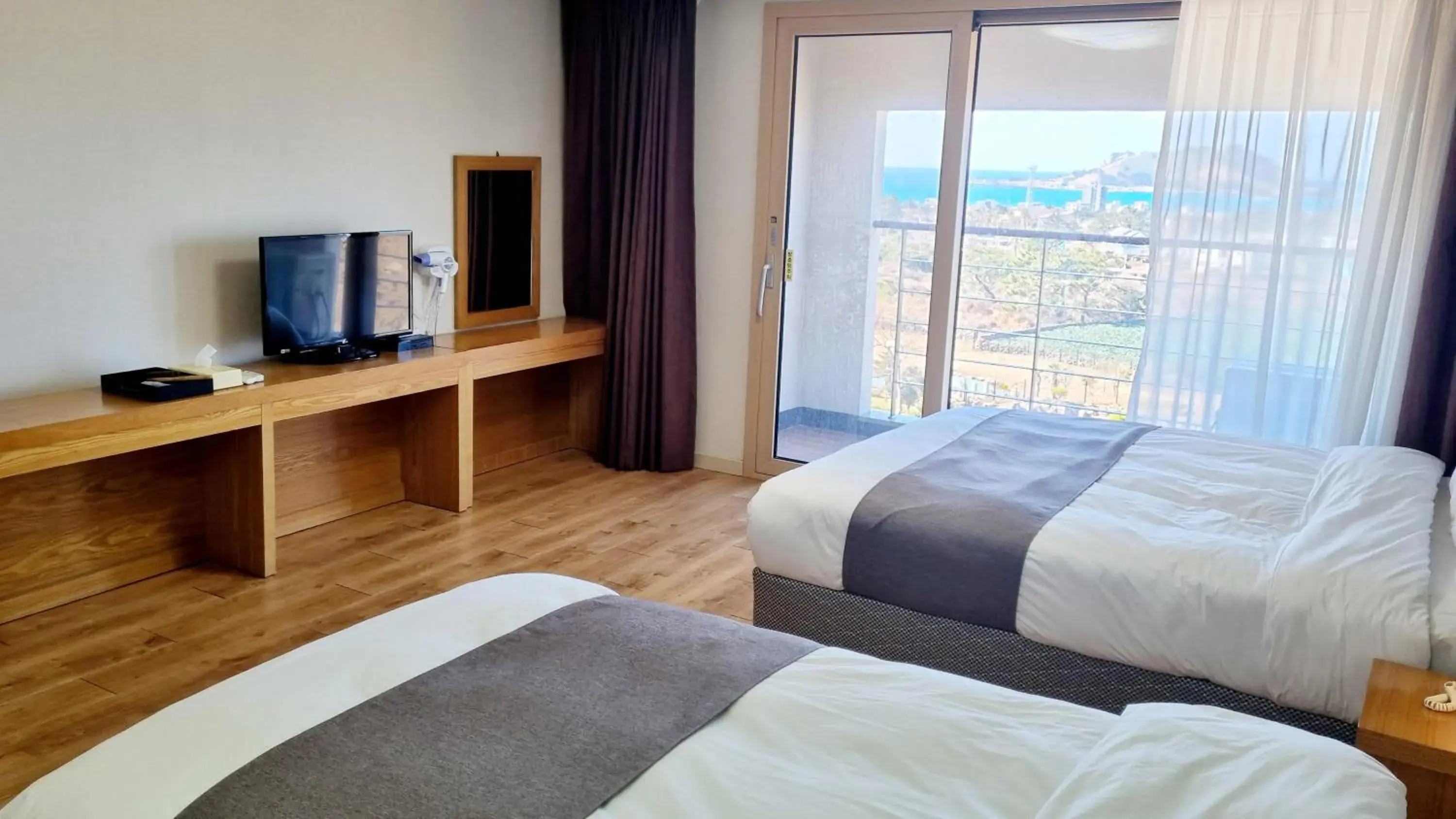 Bed in Hi Jeju Hotel Bed in Hi Jeju Hotel