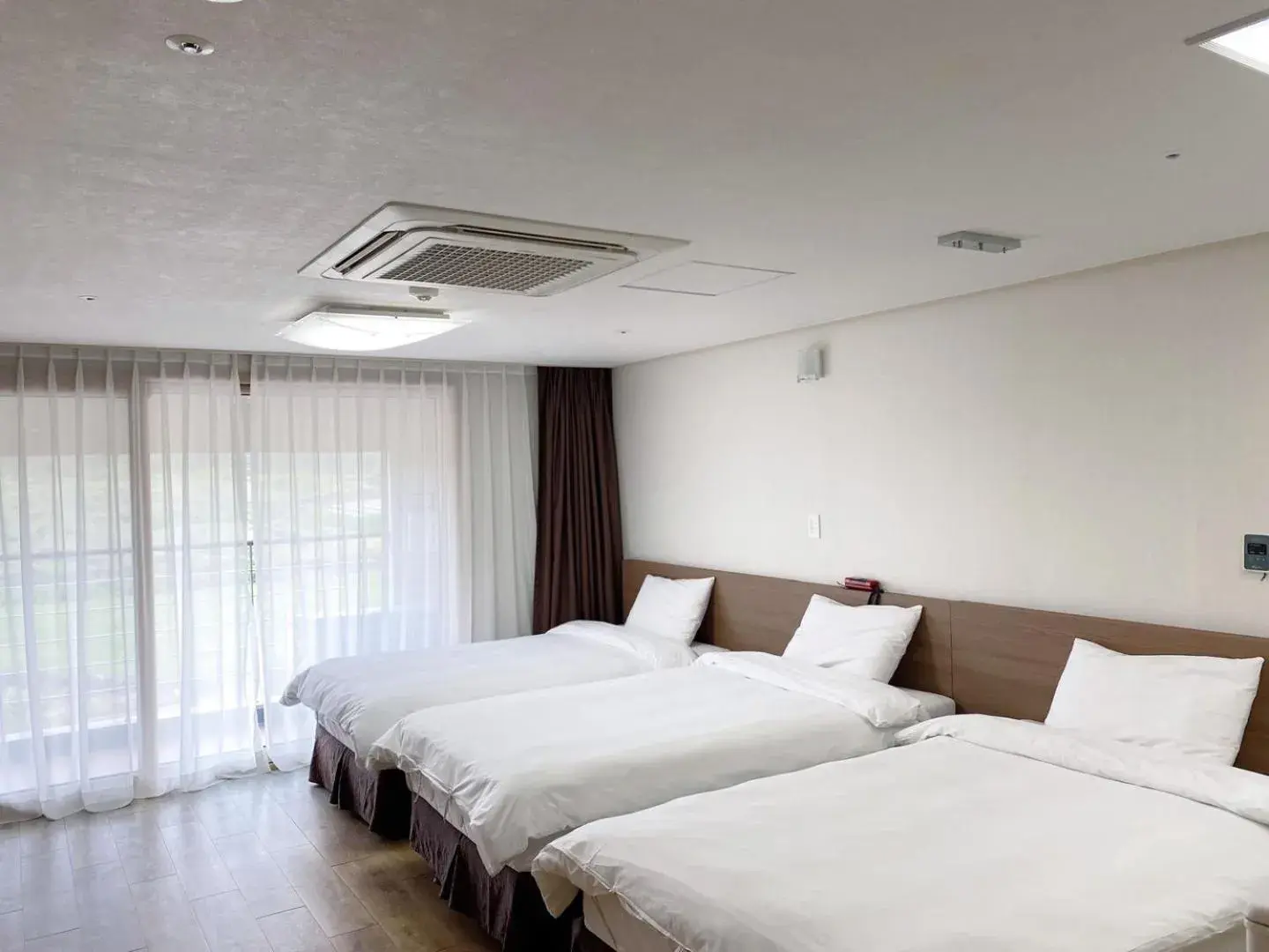 Bed in Hi Jeju Hotel Bed in Hi Jeju Hotel