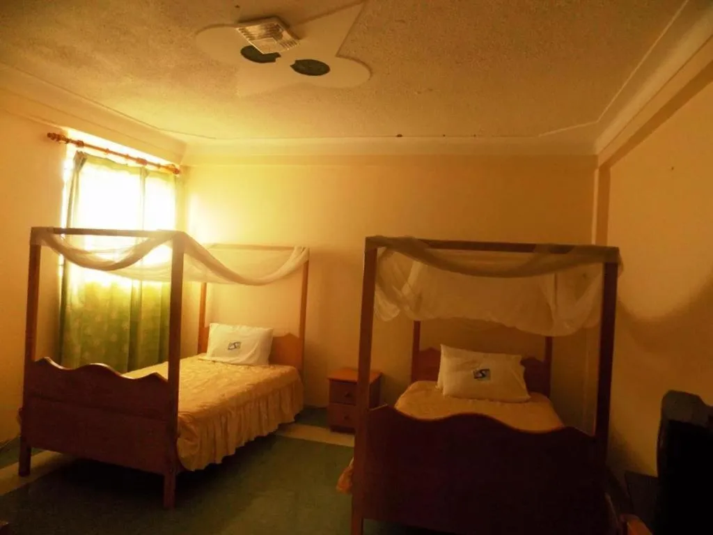 Standard Double or Twin Room - single occupancy in Palm Springs Hotel Masaka