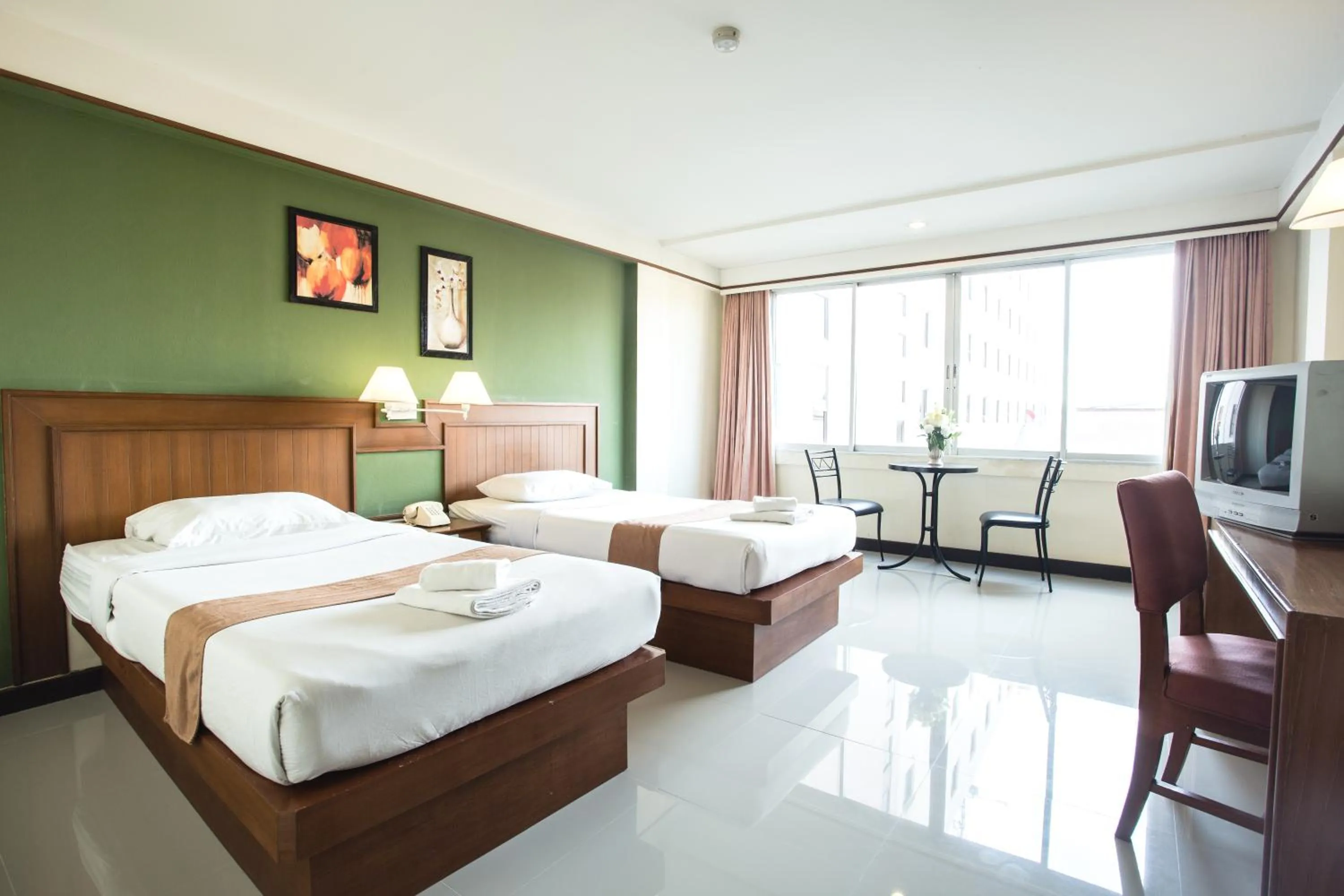 Photo of the whole room, Bed in Songphanburi Hotel