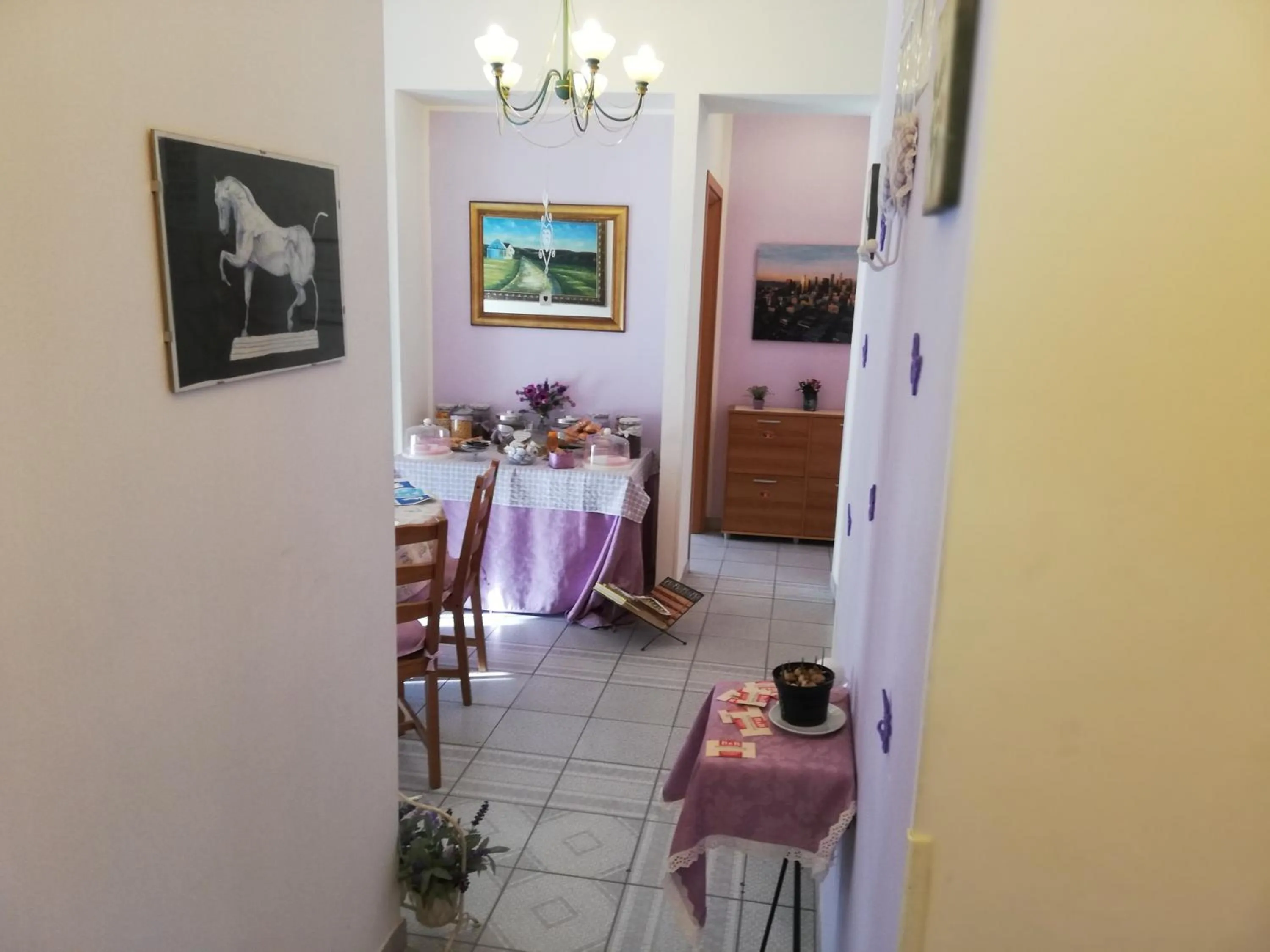 Communal lounge/ TV room in B&B Vittorio Emanuele