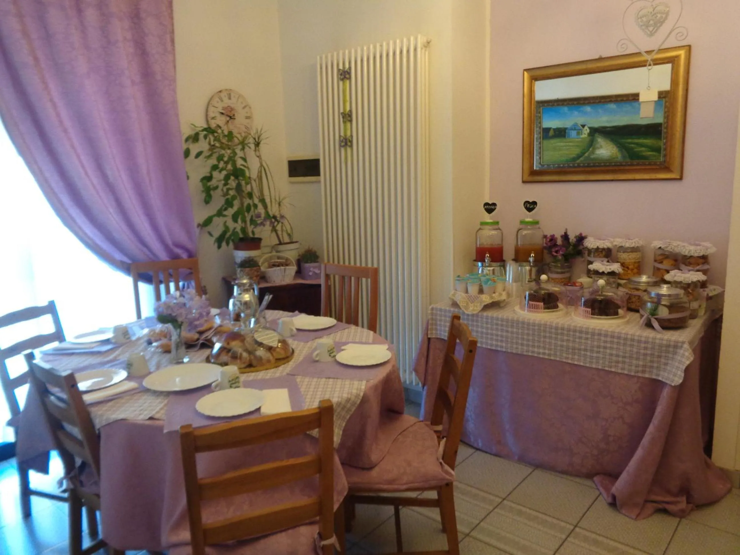 Communal lounge/ TV room in B&B Vittorio Emanuele