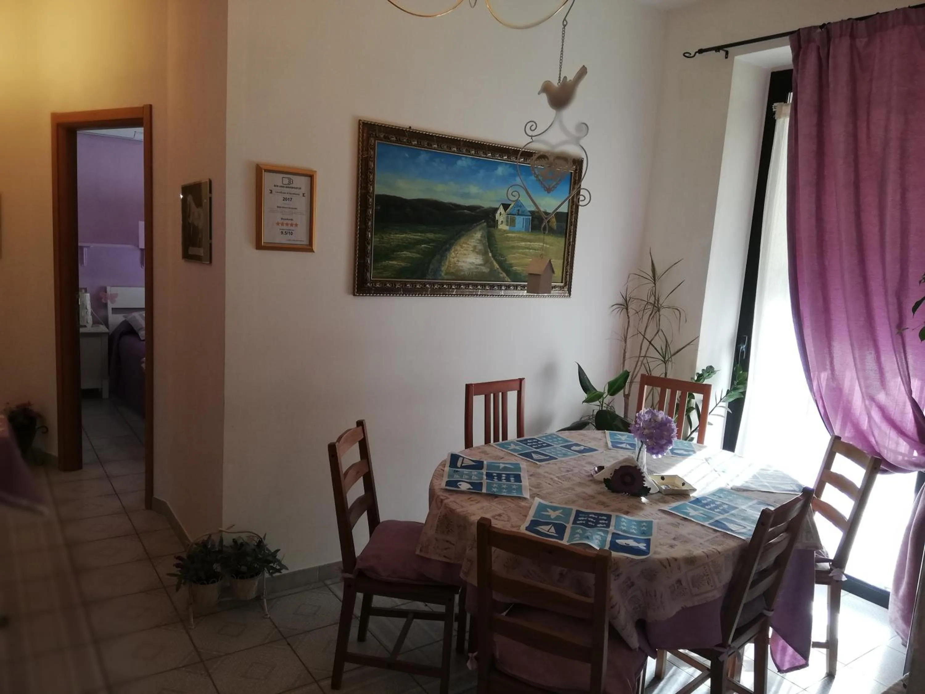 Communal lounge/ TV room in B&B Vittorio Emanuele