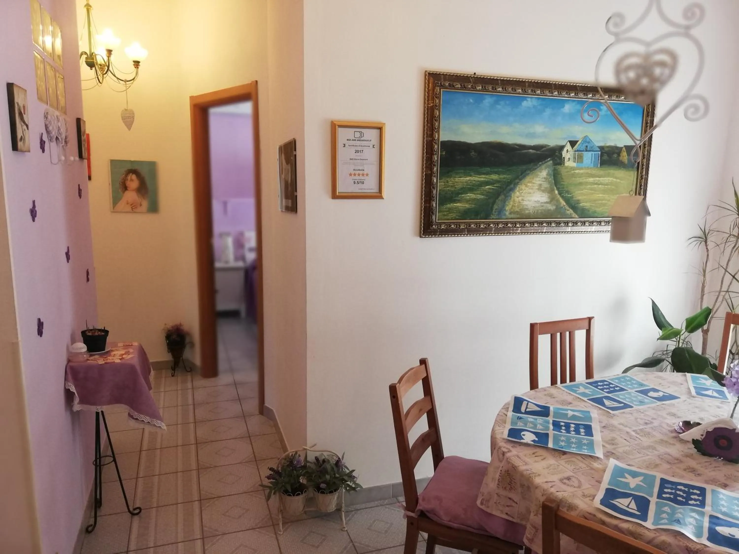 Communal lounge/ TV room in B&B Vittorio Emanuele