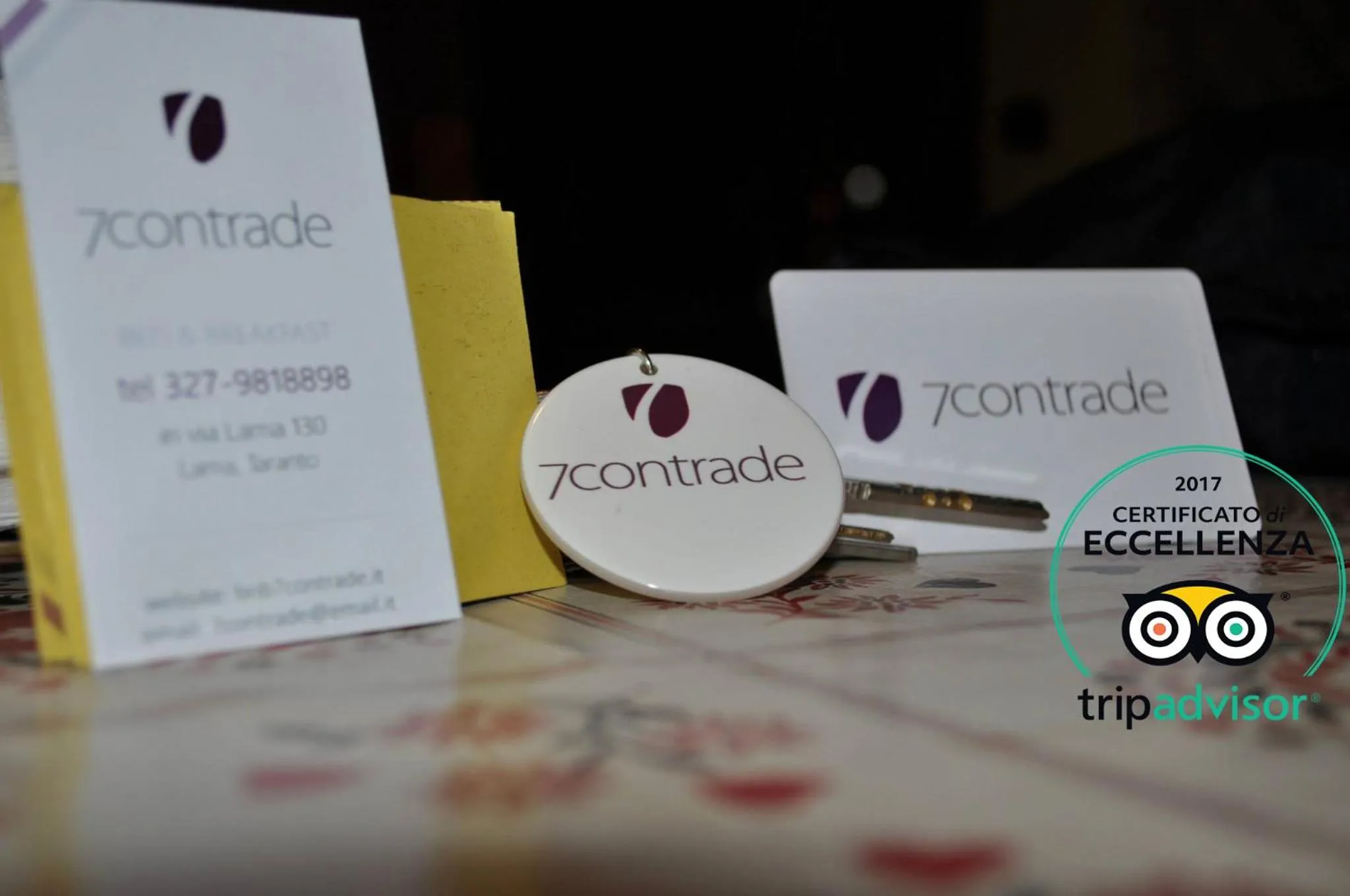 Property logo or sign in 7 Contrade