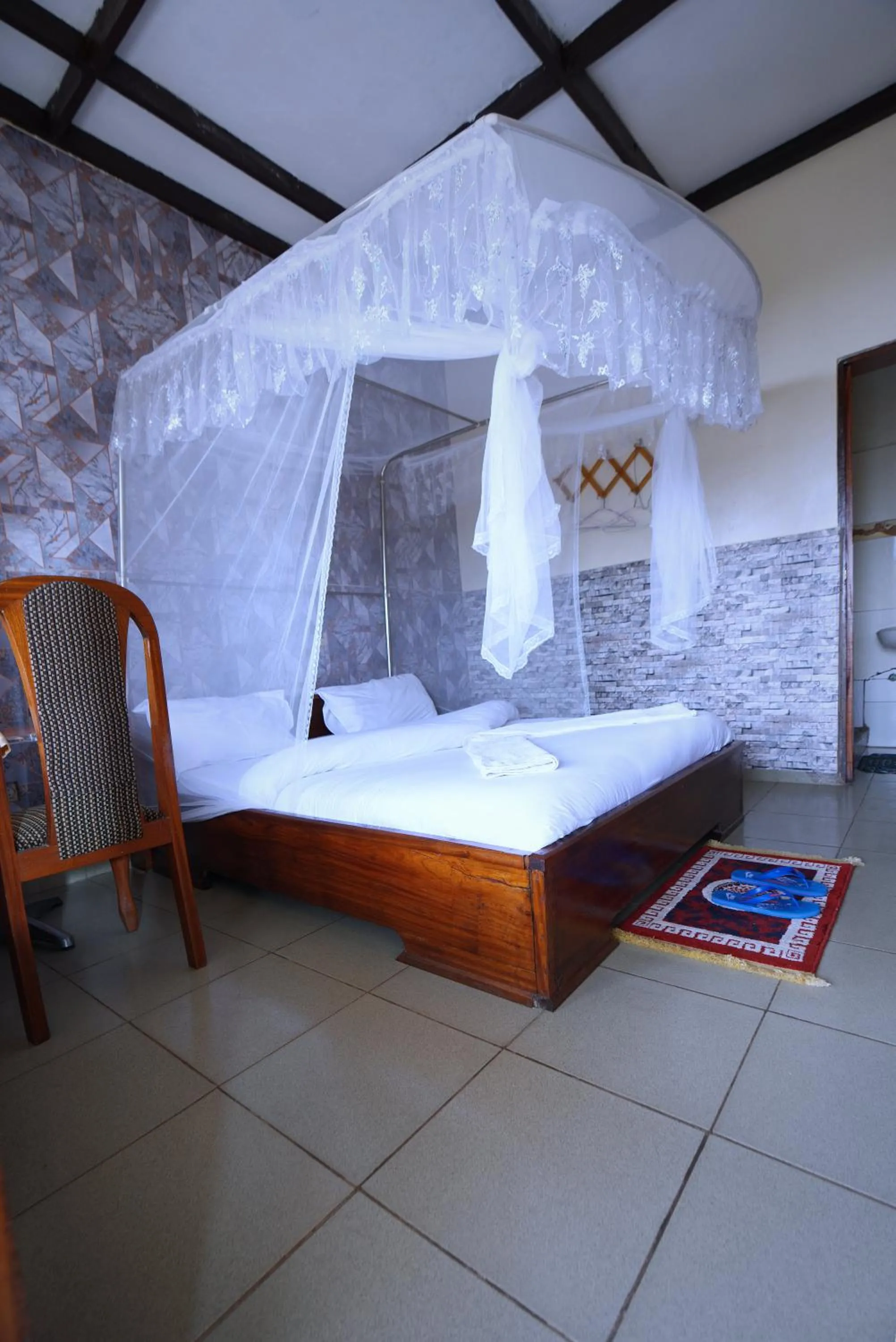 Deluxe Double Room with Balcony - single occupancy in Kivu Nest Hotel