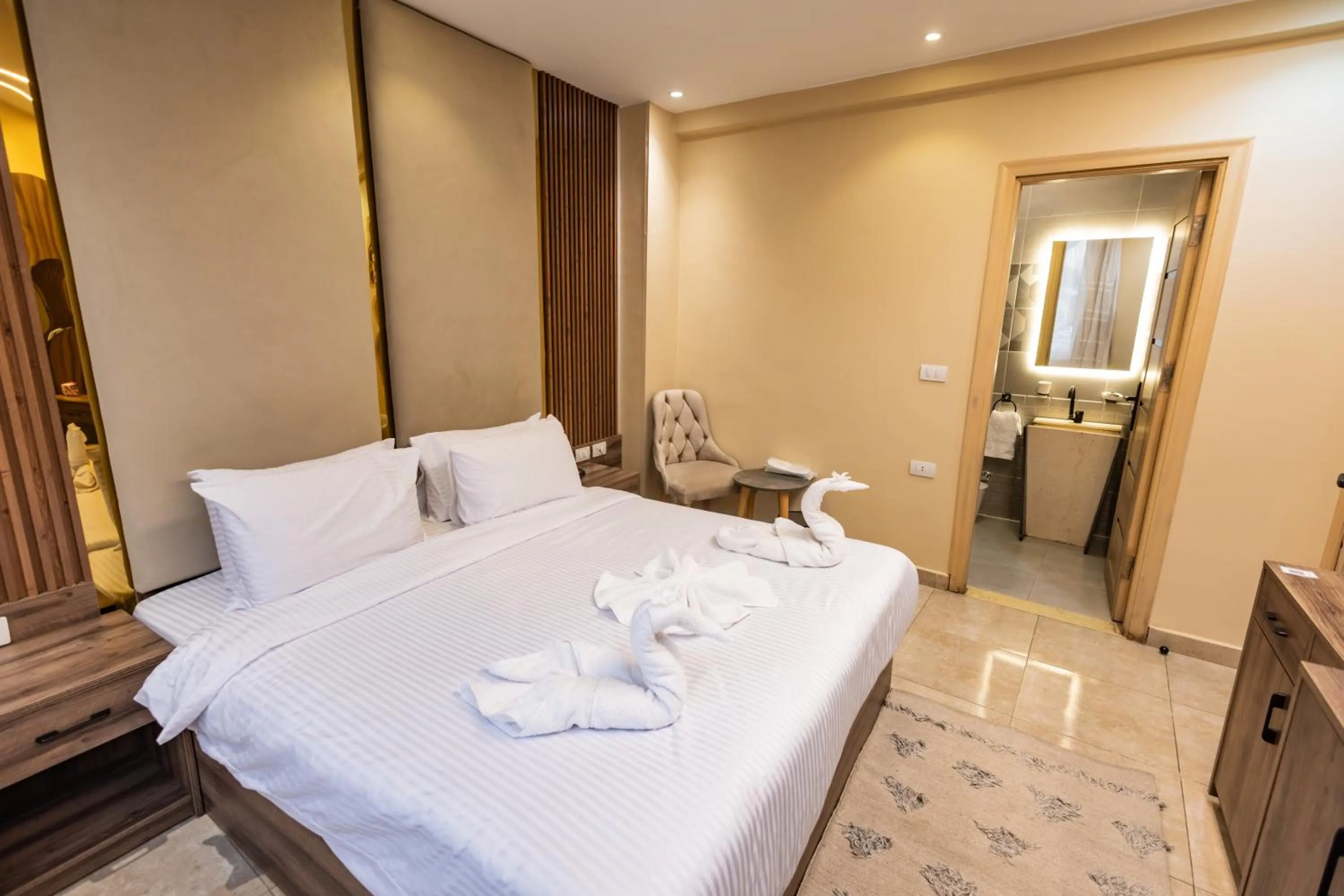 Bed in The Palace Pyramids View Hotel