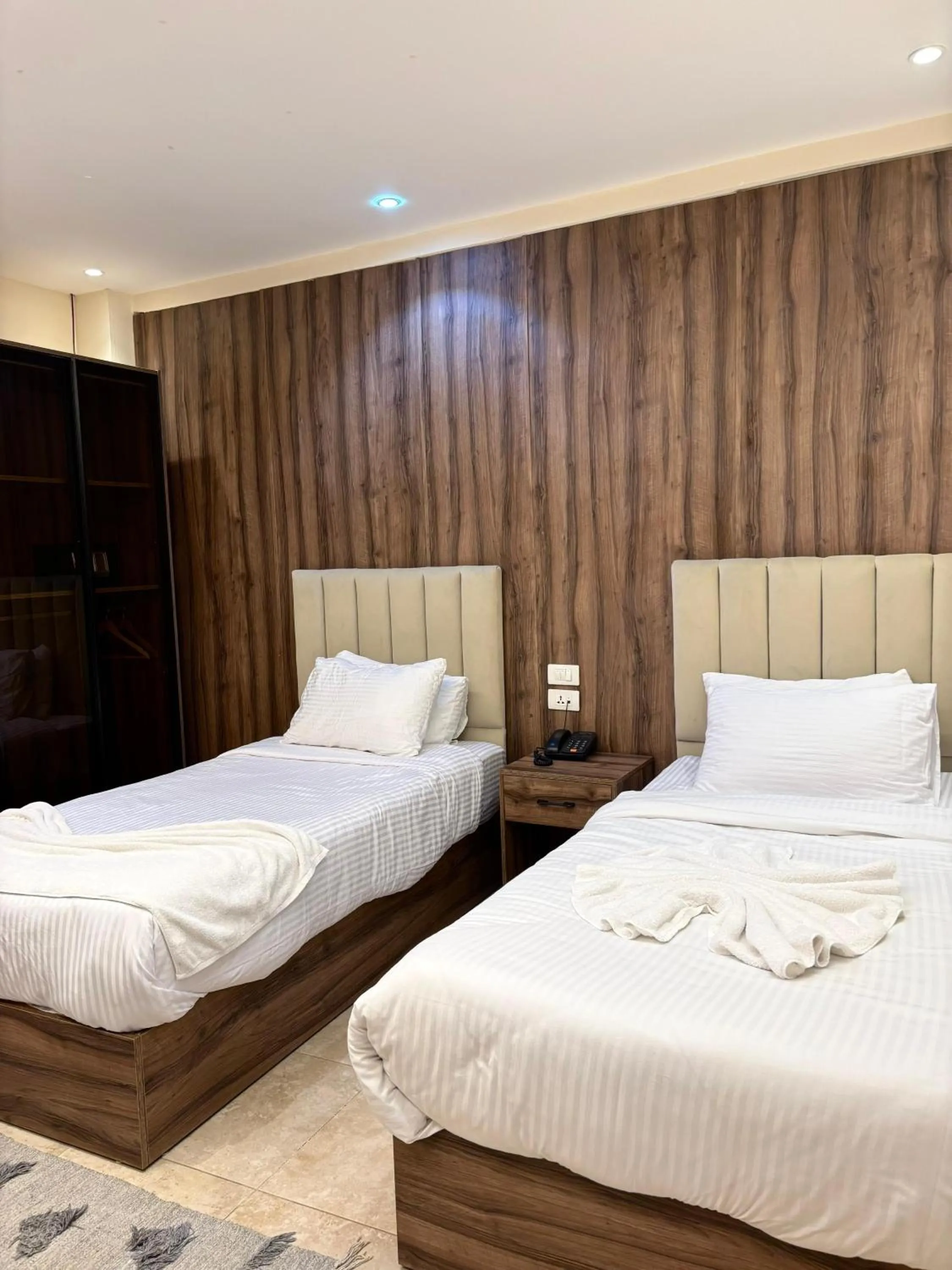 Bed in The Palace Pyramids View Hotel