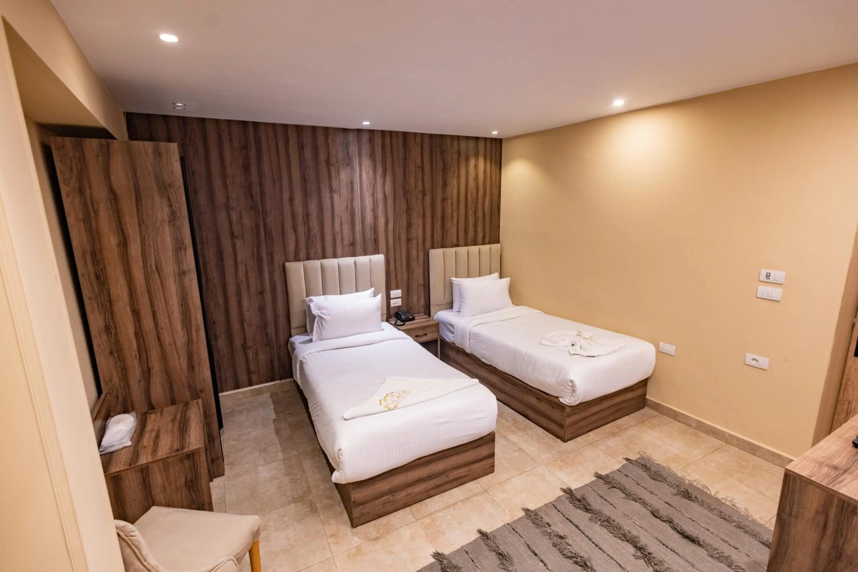 Bed in The Palace Pyramids View Hotel