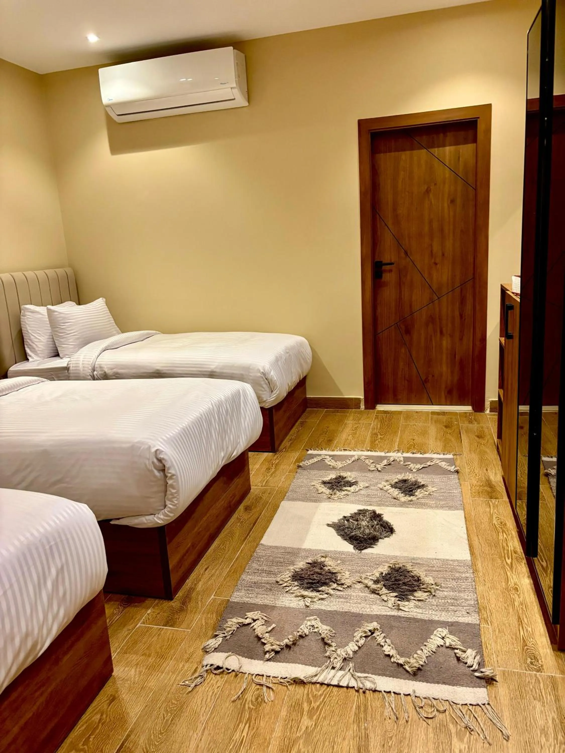 Bed in The Palace Pyramids View Hotel