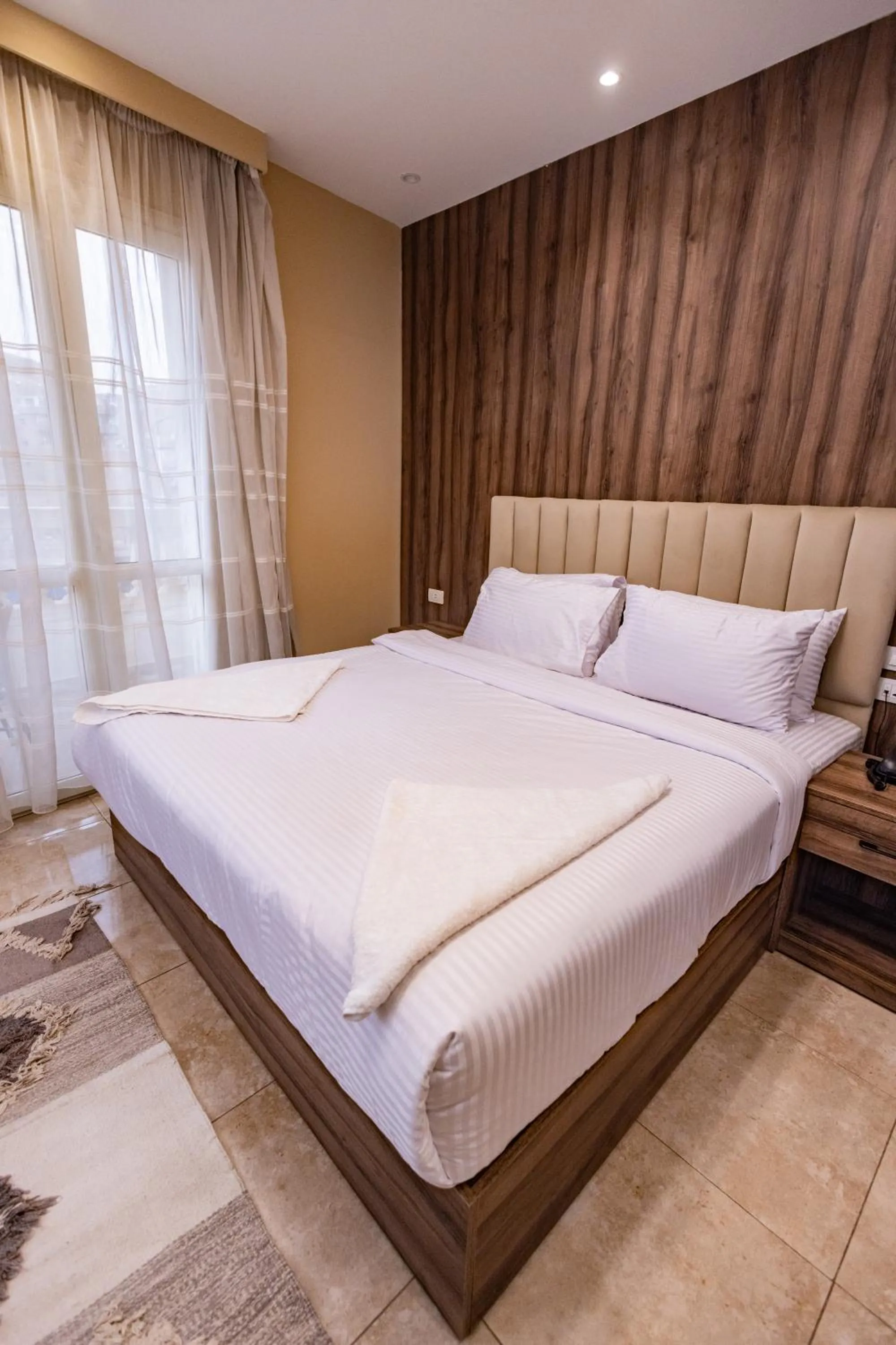 Bed in The Palace Pyramids View Hotel