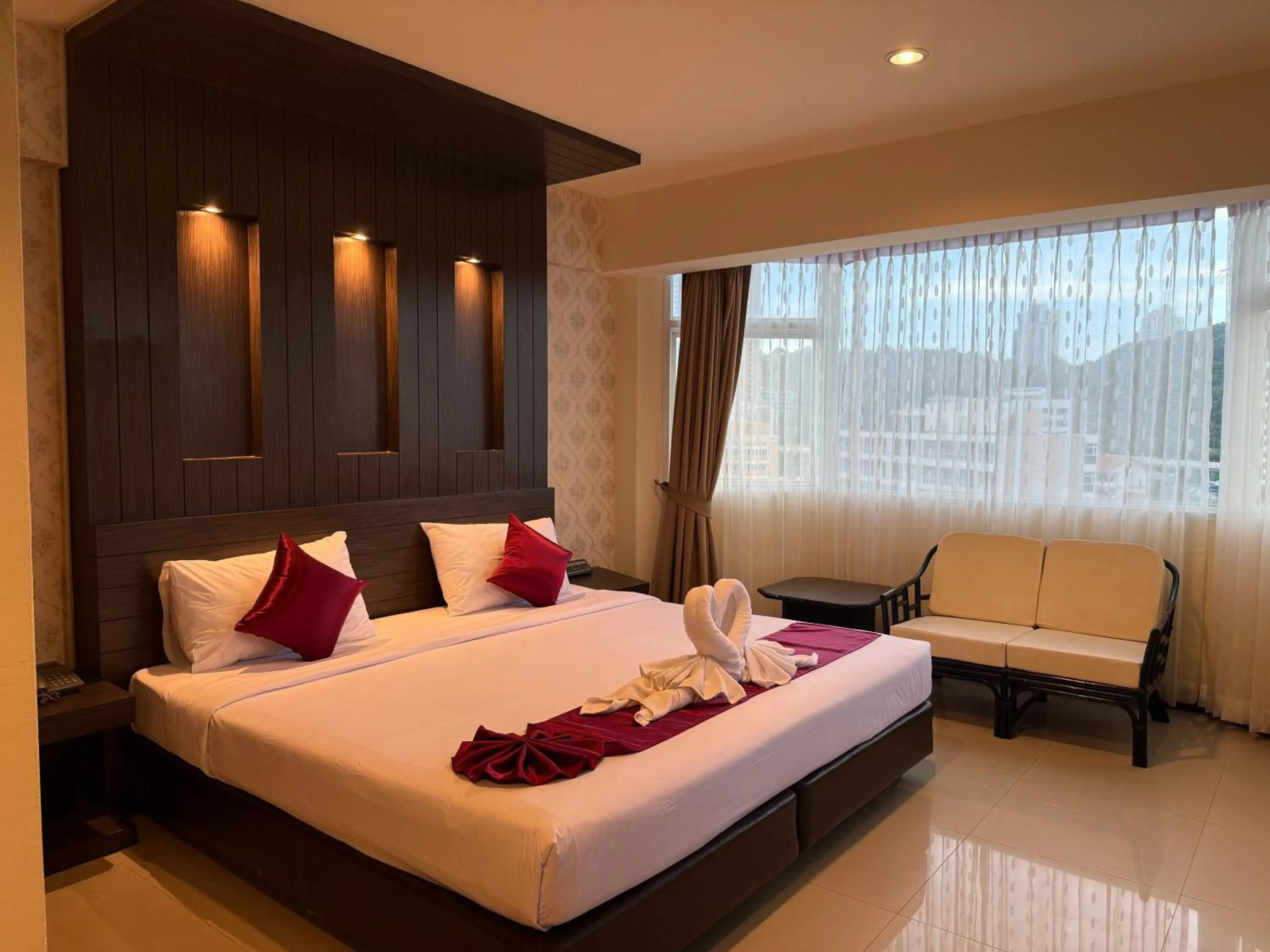 Bed in Suncity Hotel Pattaya