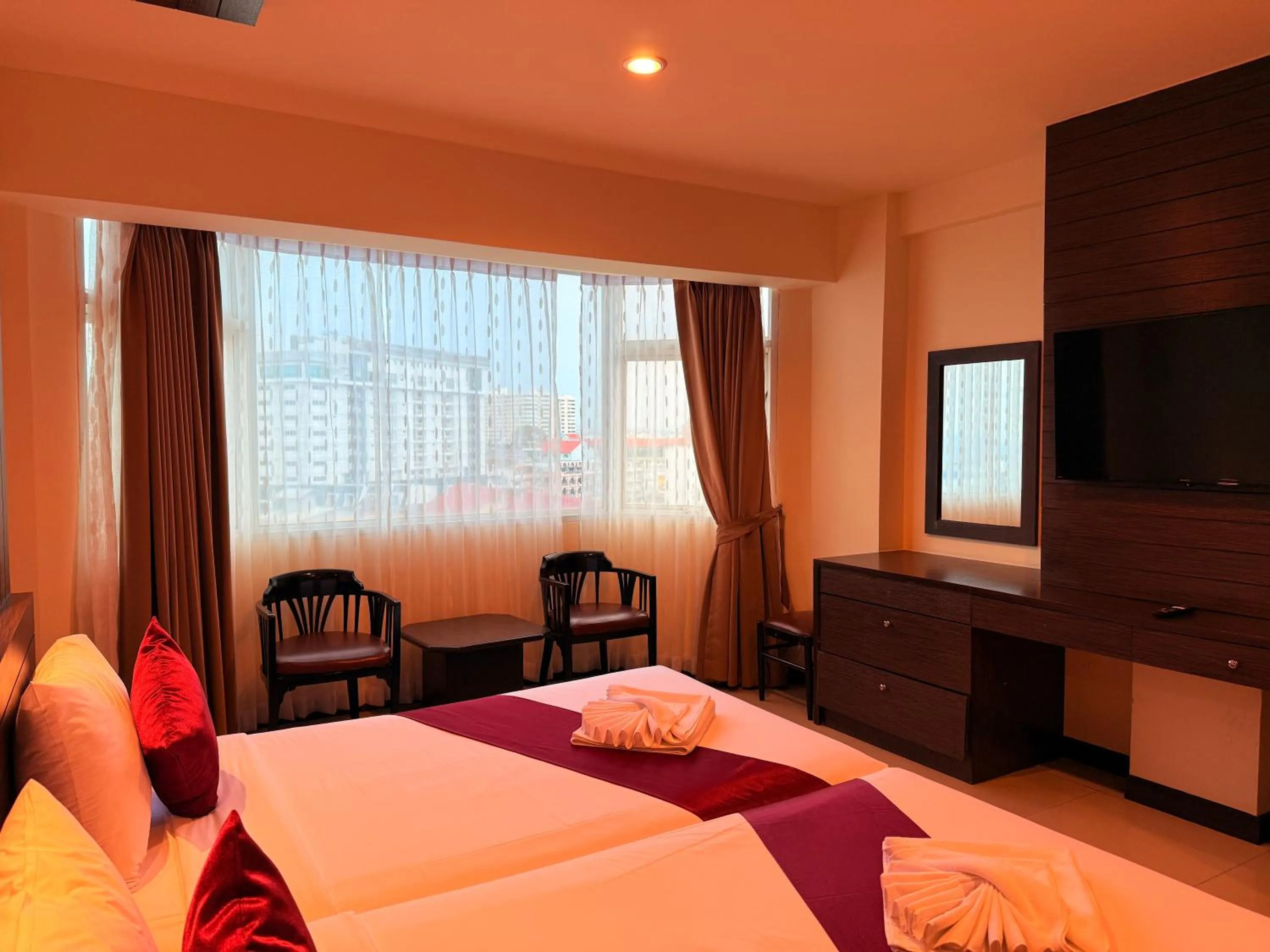Bed in Suncity Hotel Pattaya