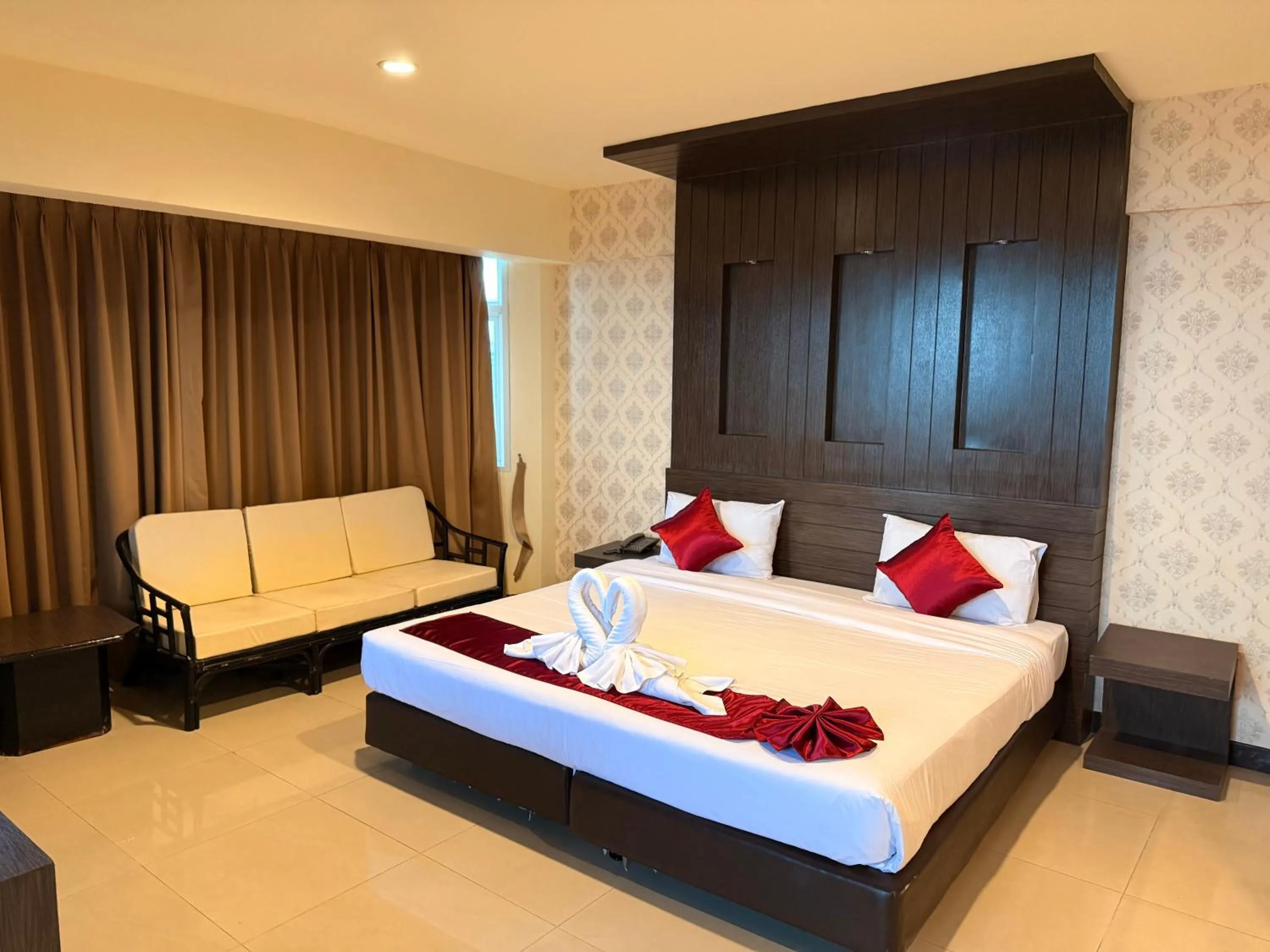 Bed in Suncity Hotel Pattaya