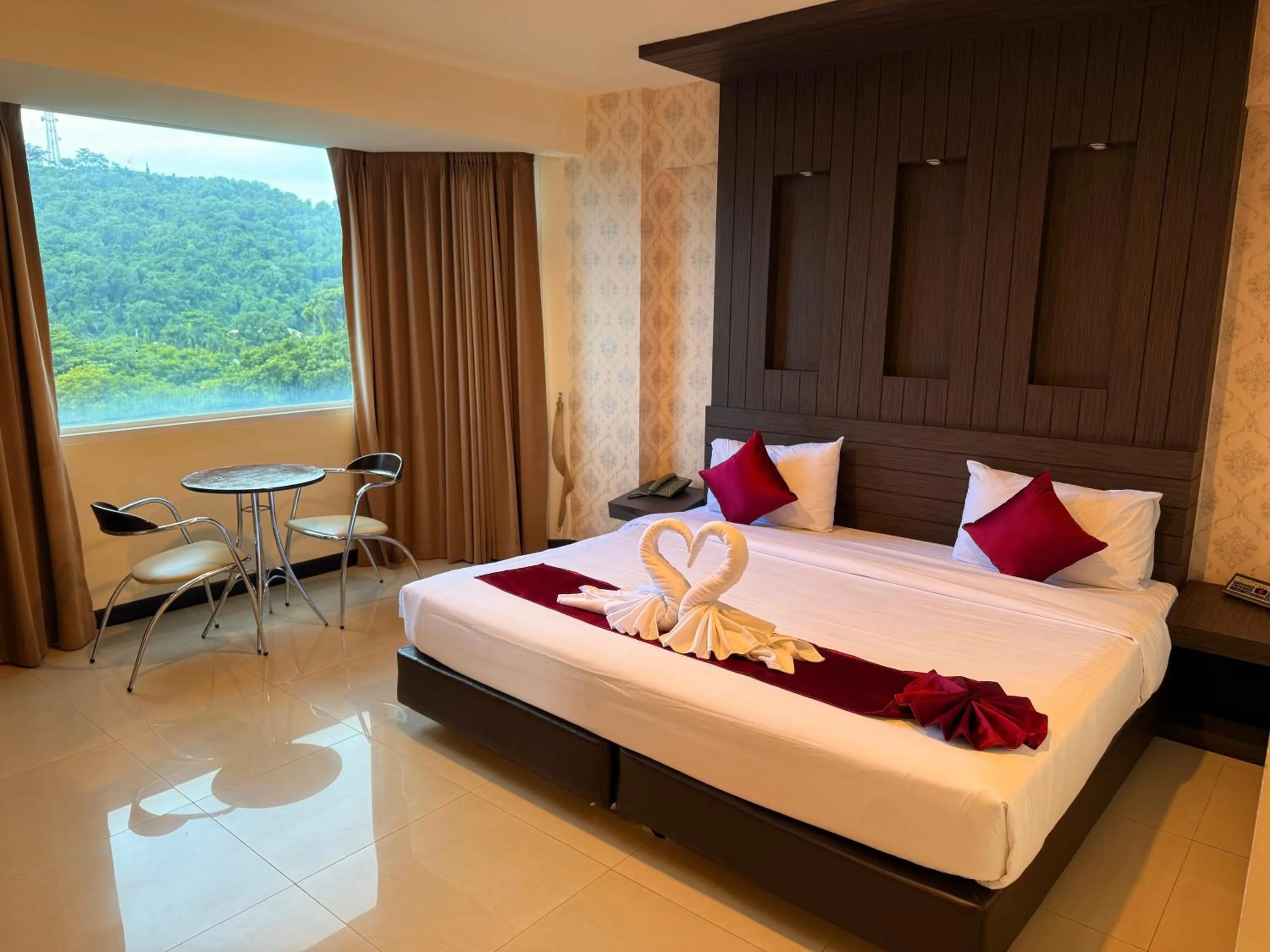 Bed in Suncity Hotel Pattaya