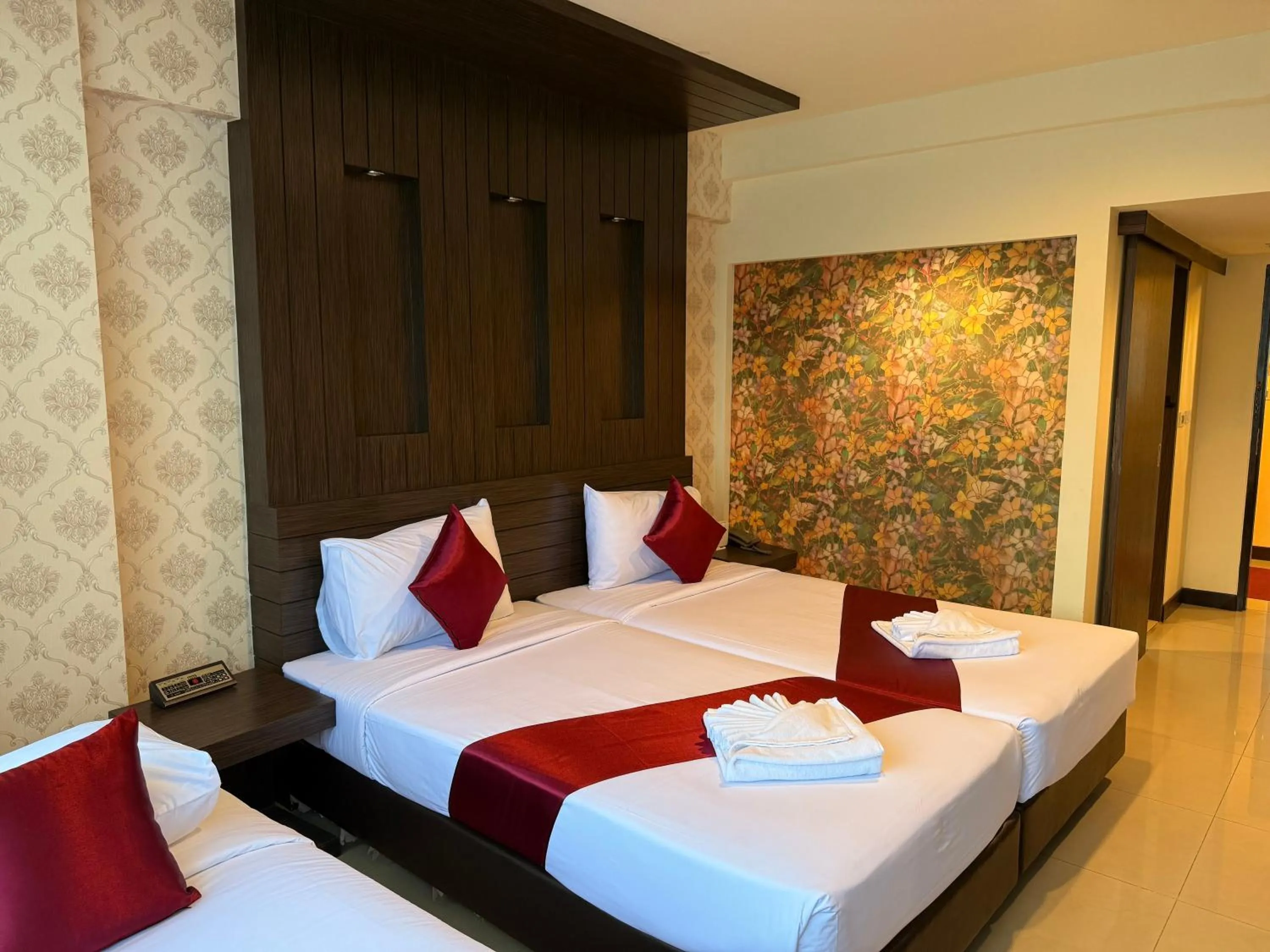 Bed in Suncity Hotel Pattaya