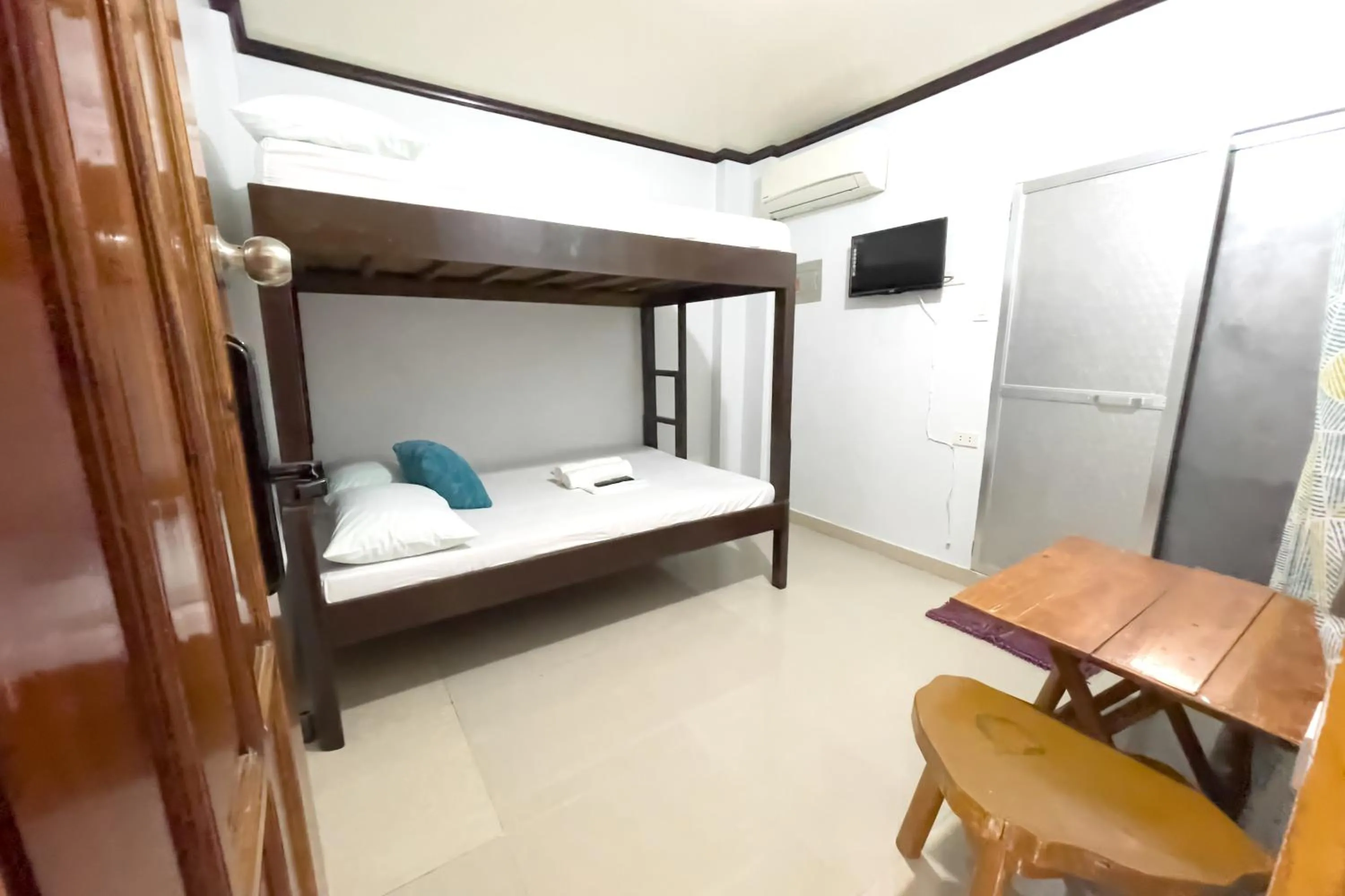 Bed in Catappa Lodge Puerto Galera