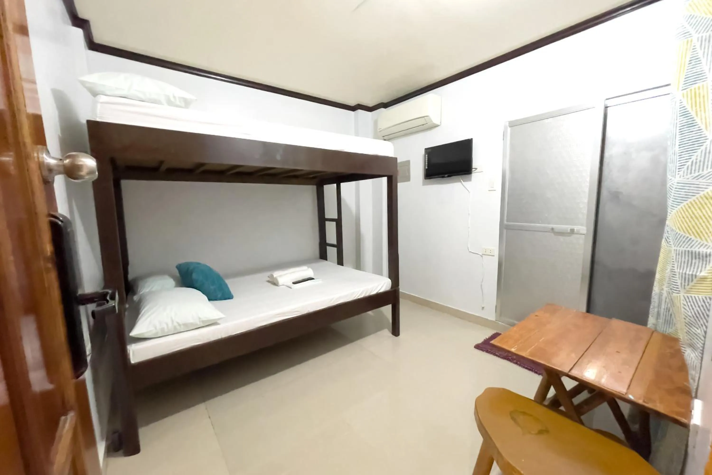 Bed in Catappa Lodge Puerto Galera