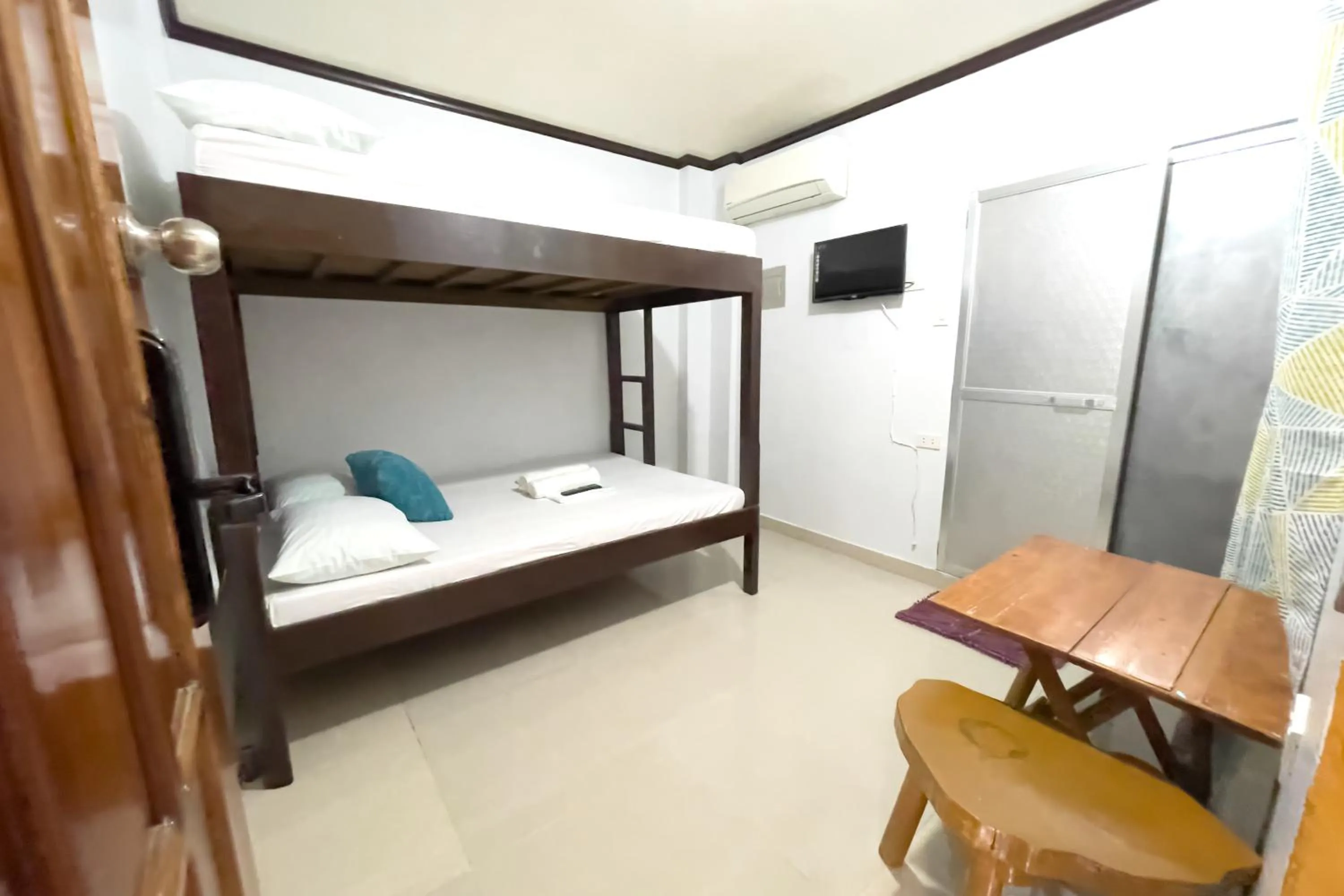 Bed in Catappa Lodge Puerto Galera