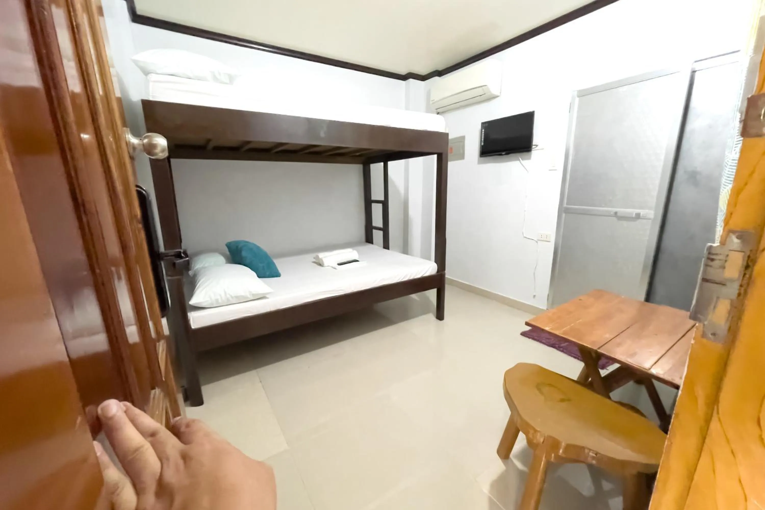 Bed in Catappa Lodge Puerto Galera