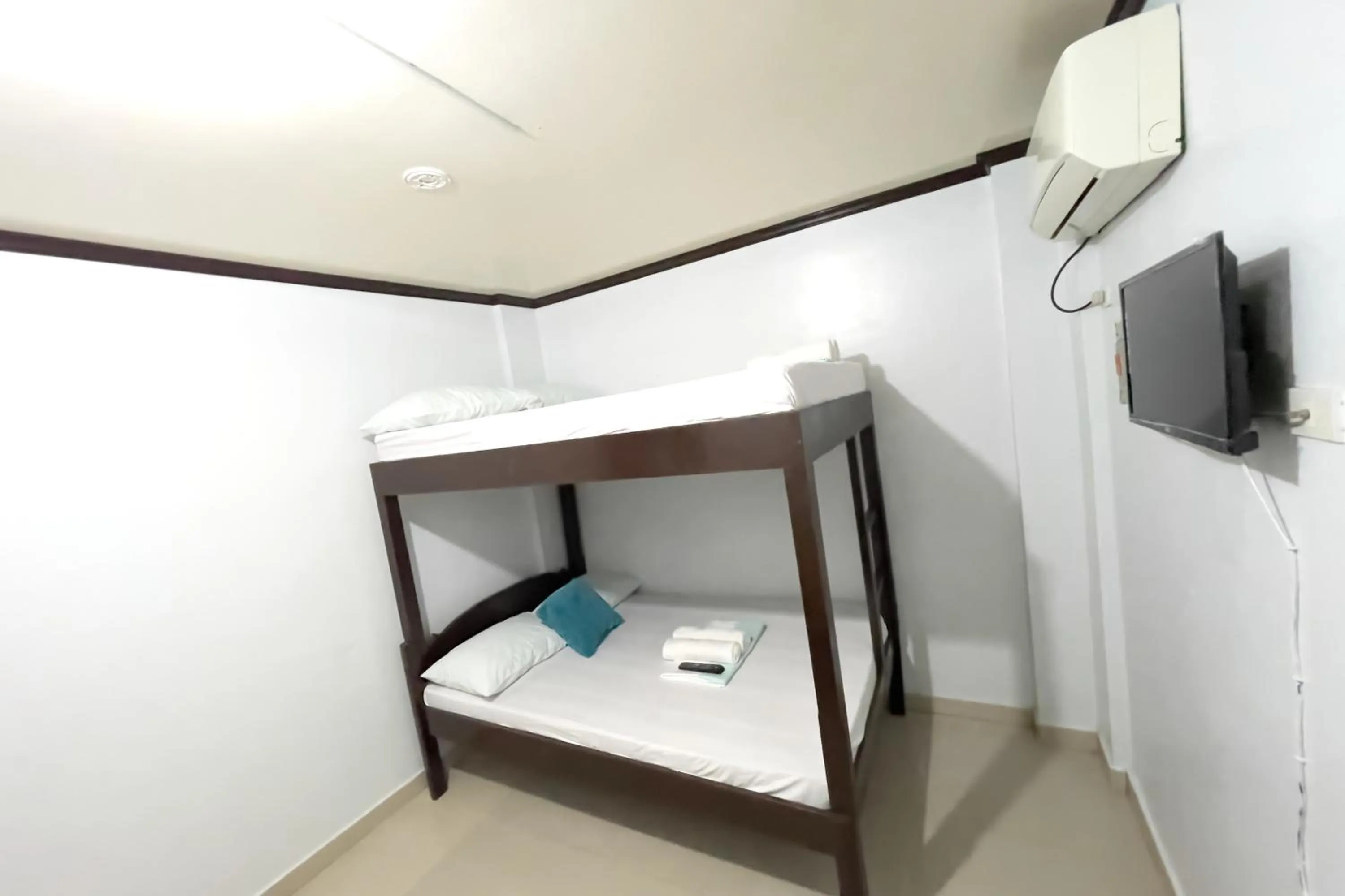 Bed in Catappa Lodge Puerto Galera