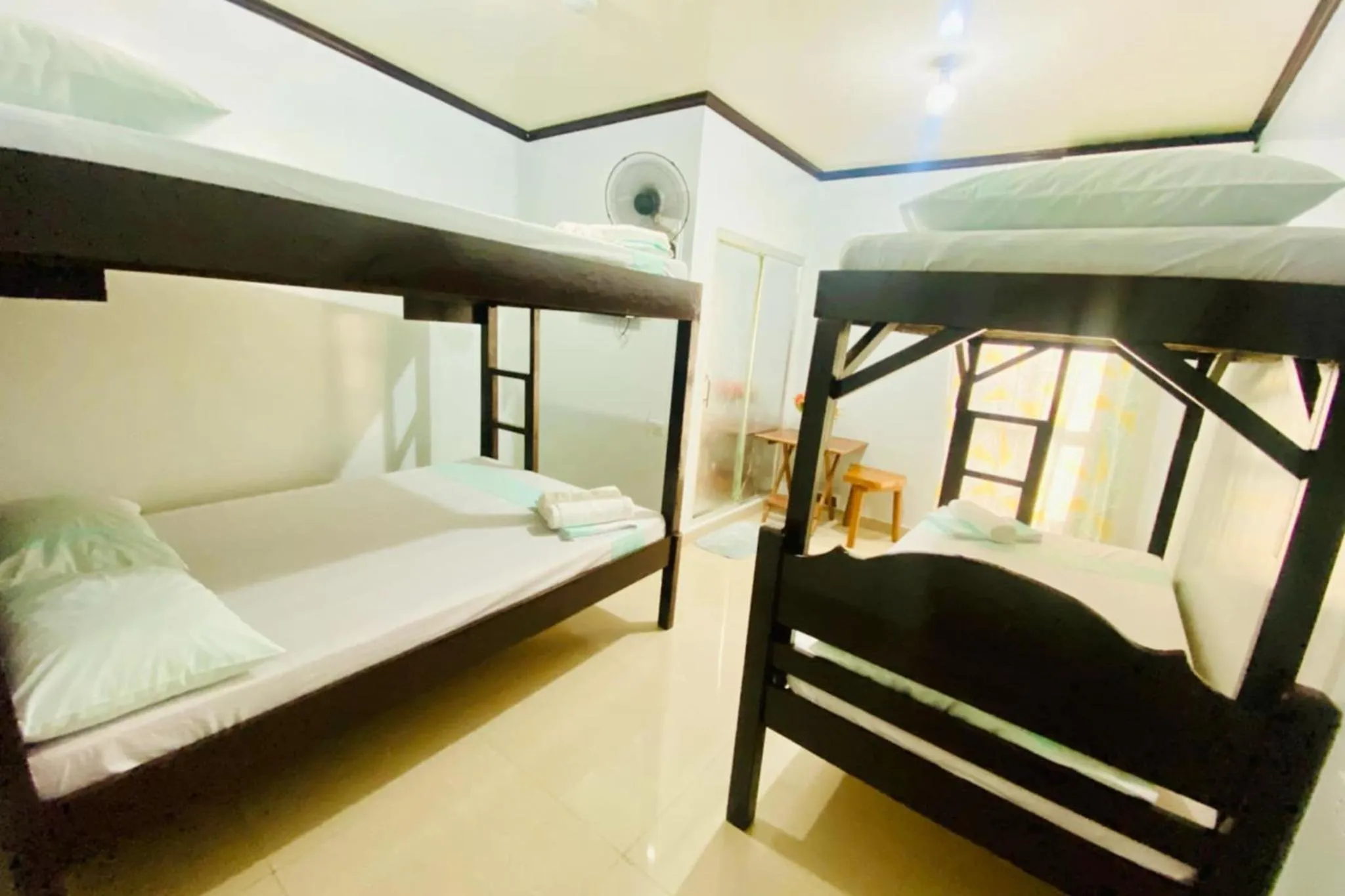 Bed in Catappa Lodge Puerto Galera