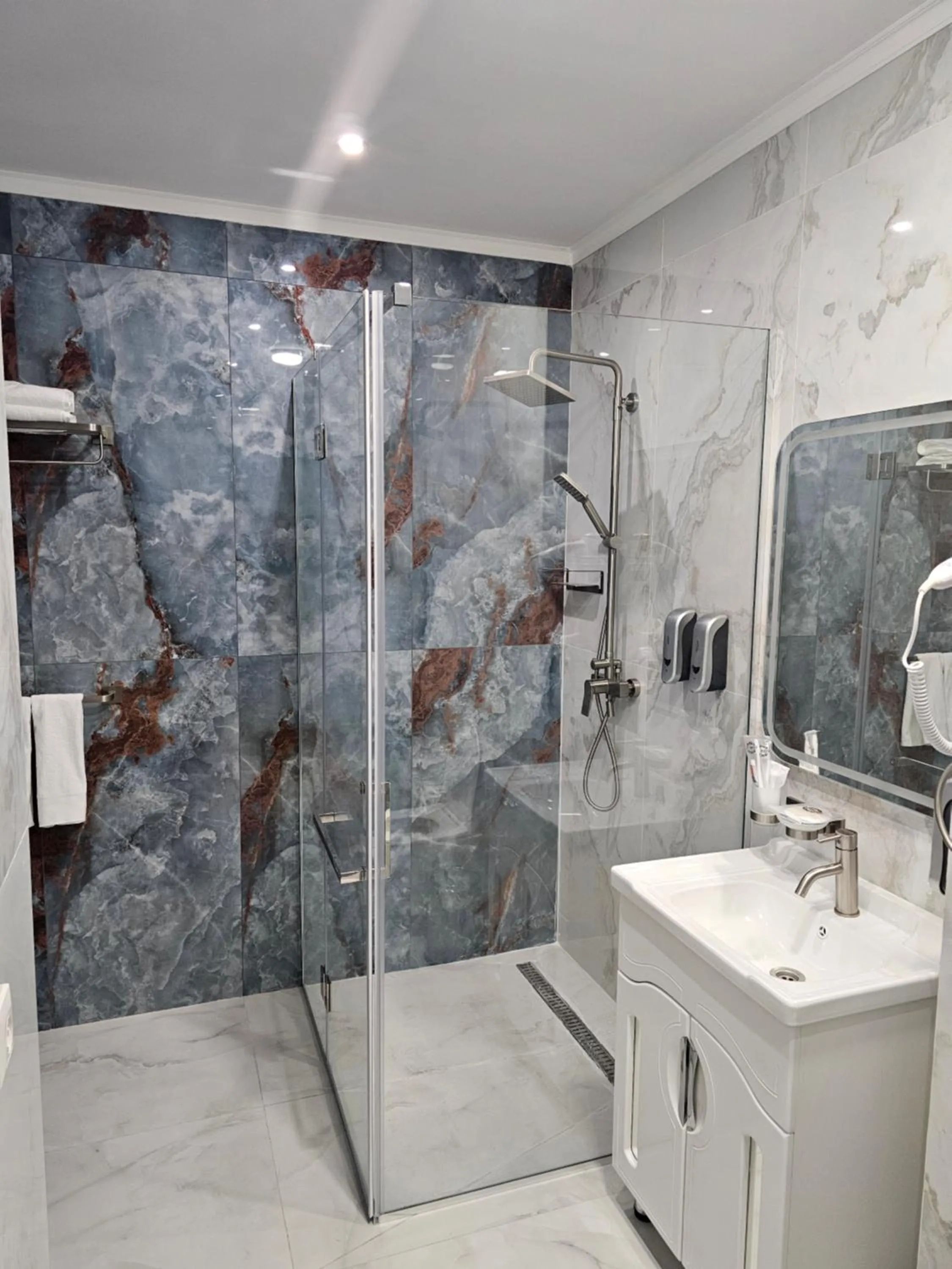 Shower in Palmira Hotel Bishkek