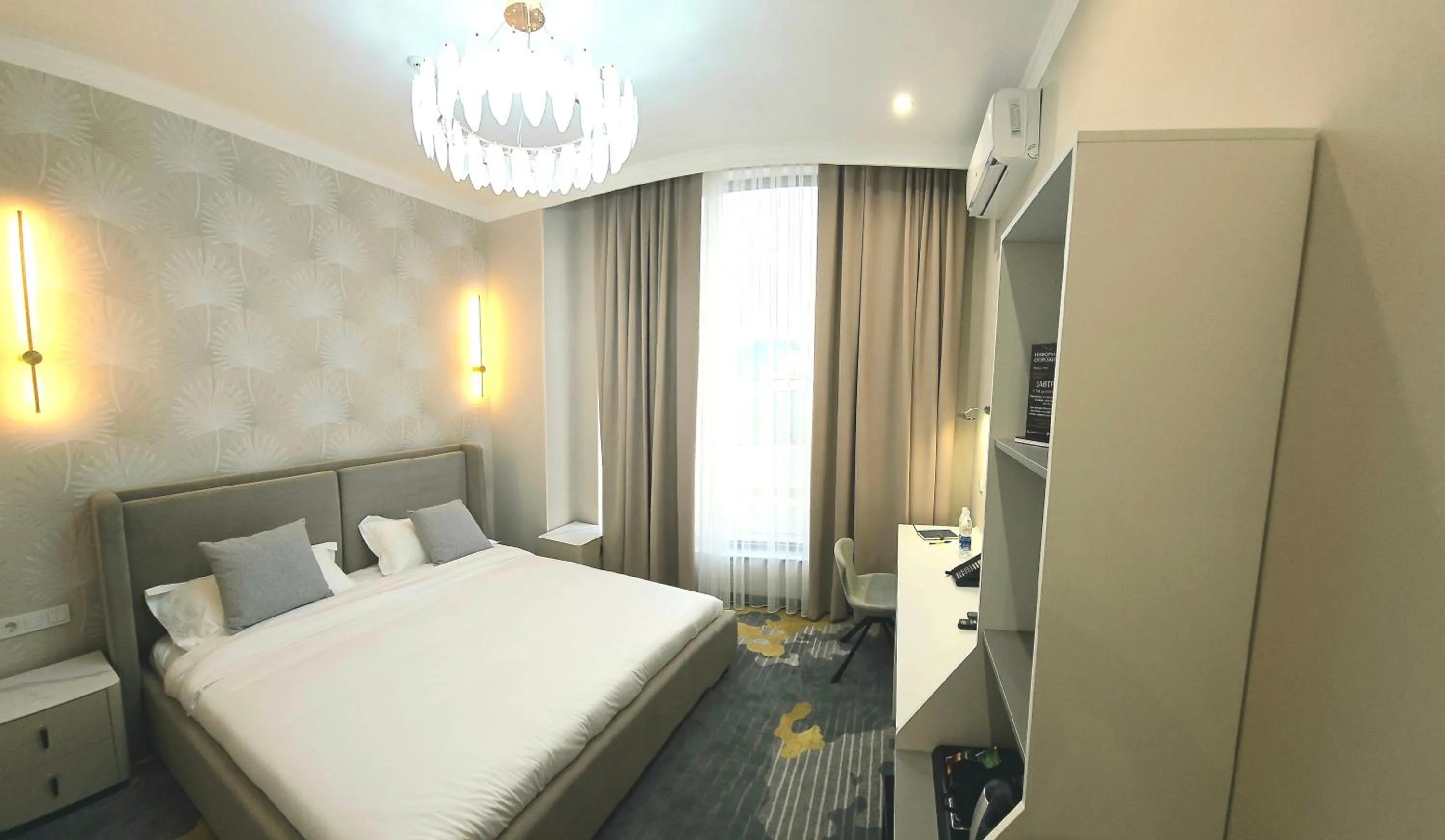 Photo of the whole room, Bed in Palmira Hotel Bishkek