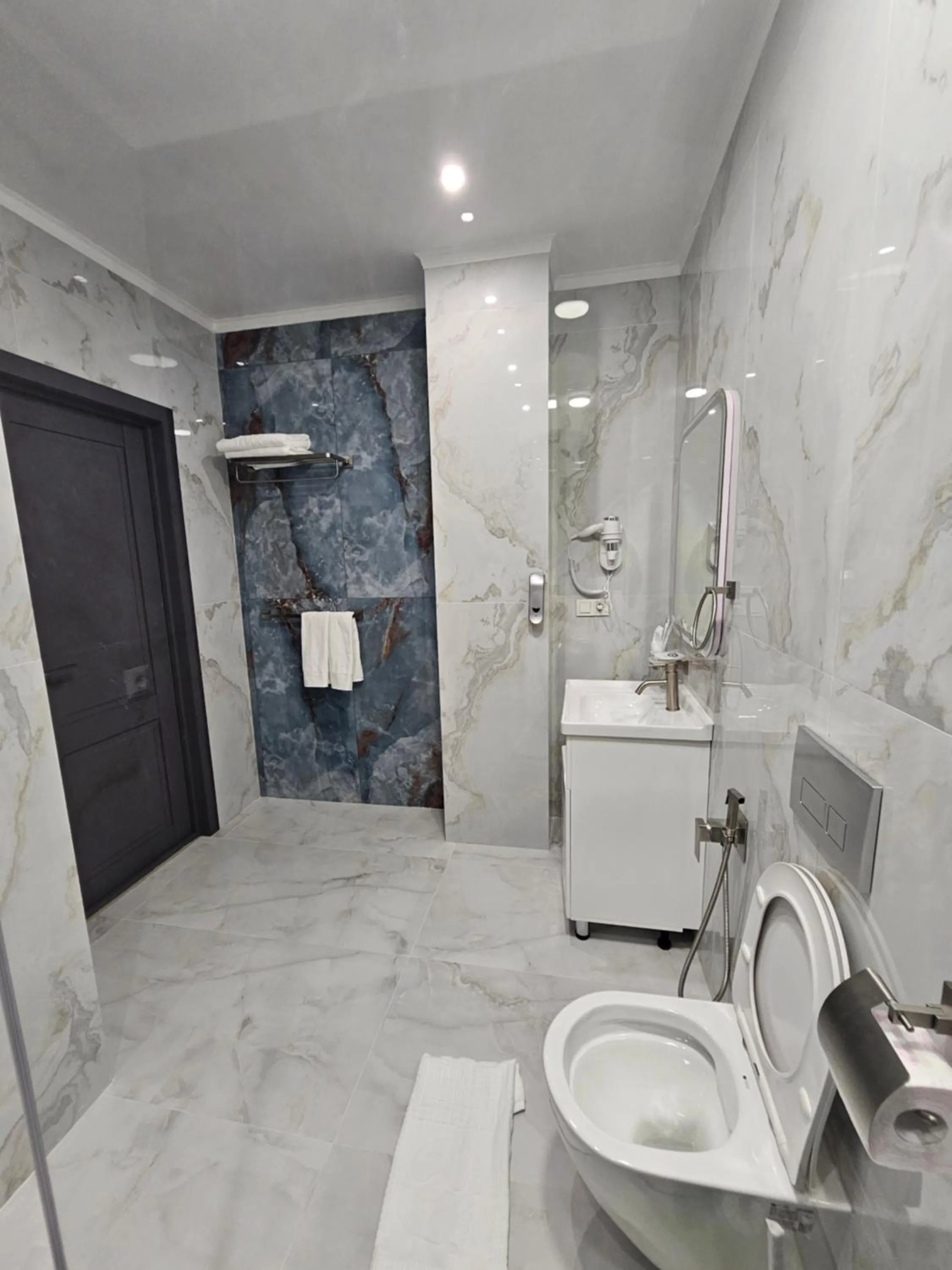 Shower in Palmira Hotel Bishkek