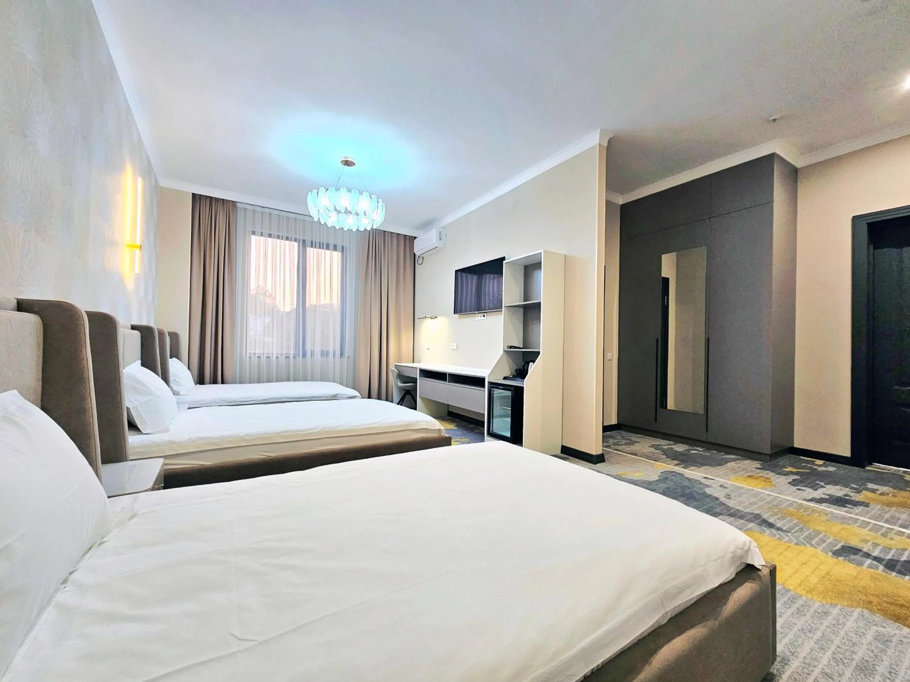 Bed in Palmira Hotel Bishkek