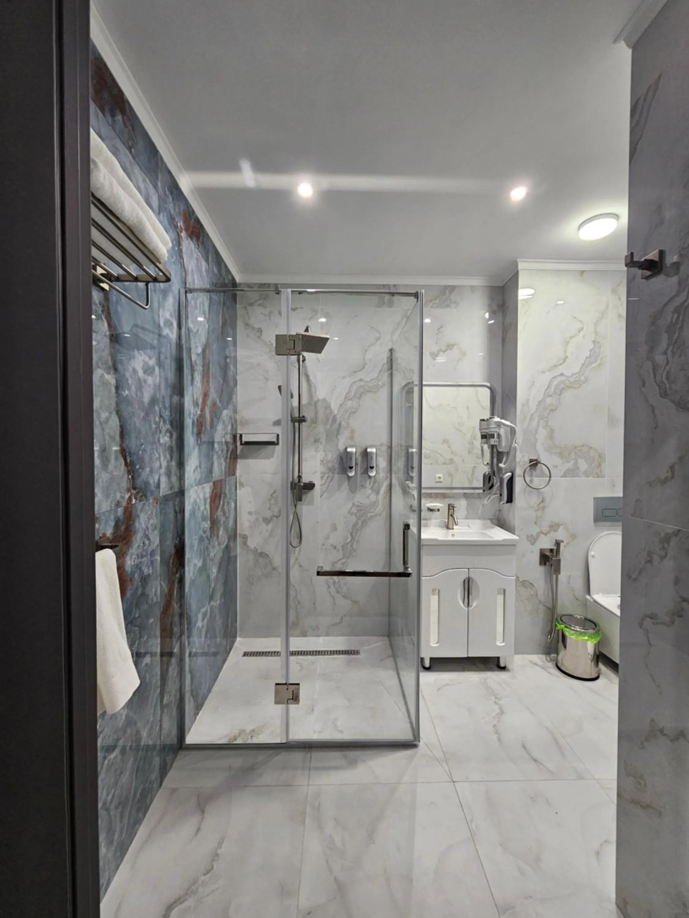 Shower in Palmira Hotel Bishkek