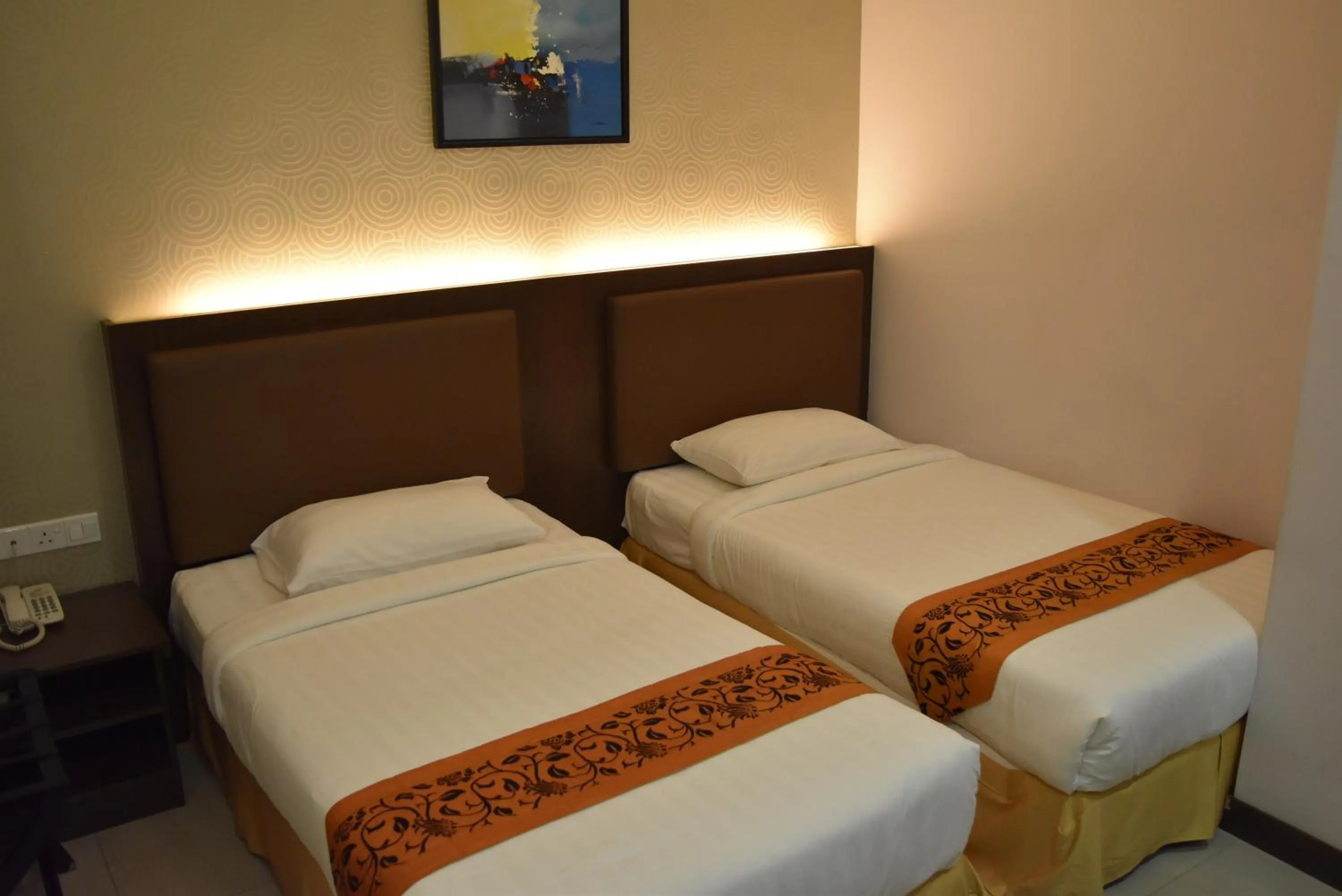 Bed in Sunrise Hotel