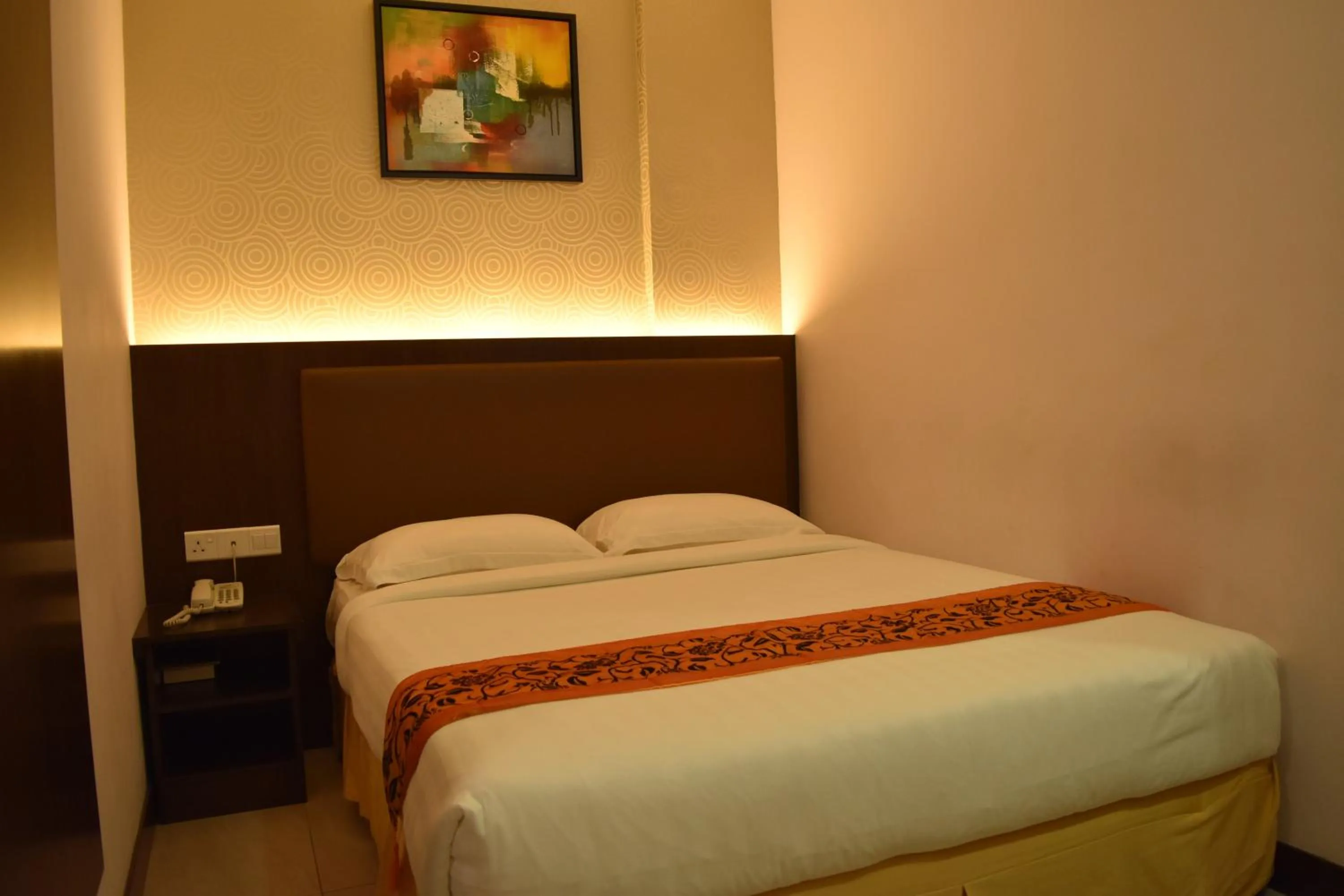 Bed in Sunrise Hotel