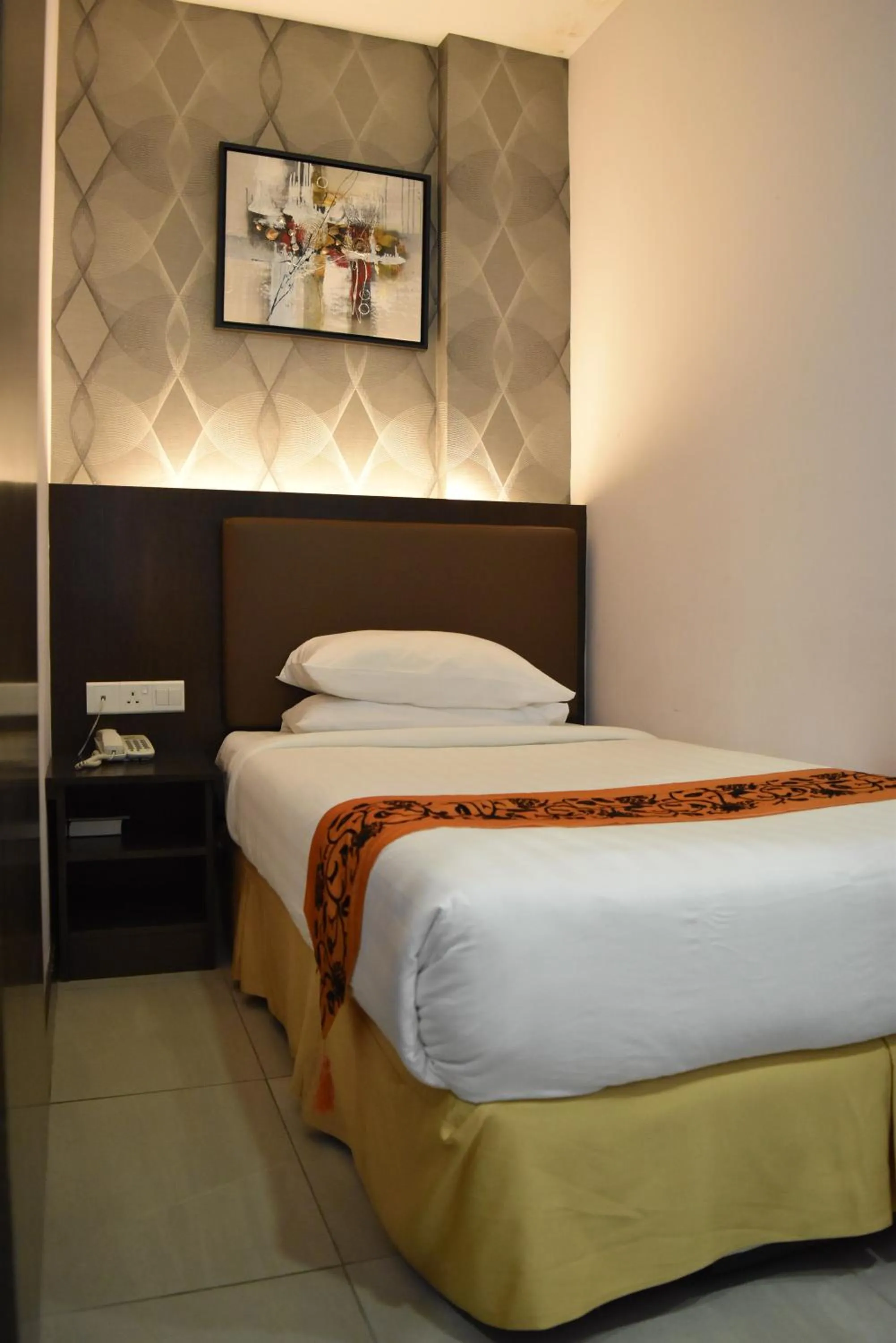 Bed in Sunrise Hotel