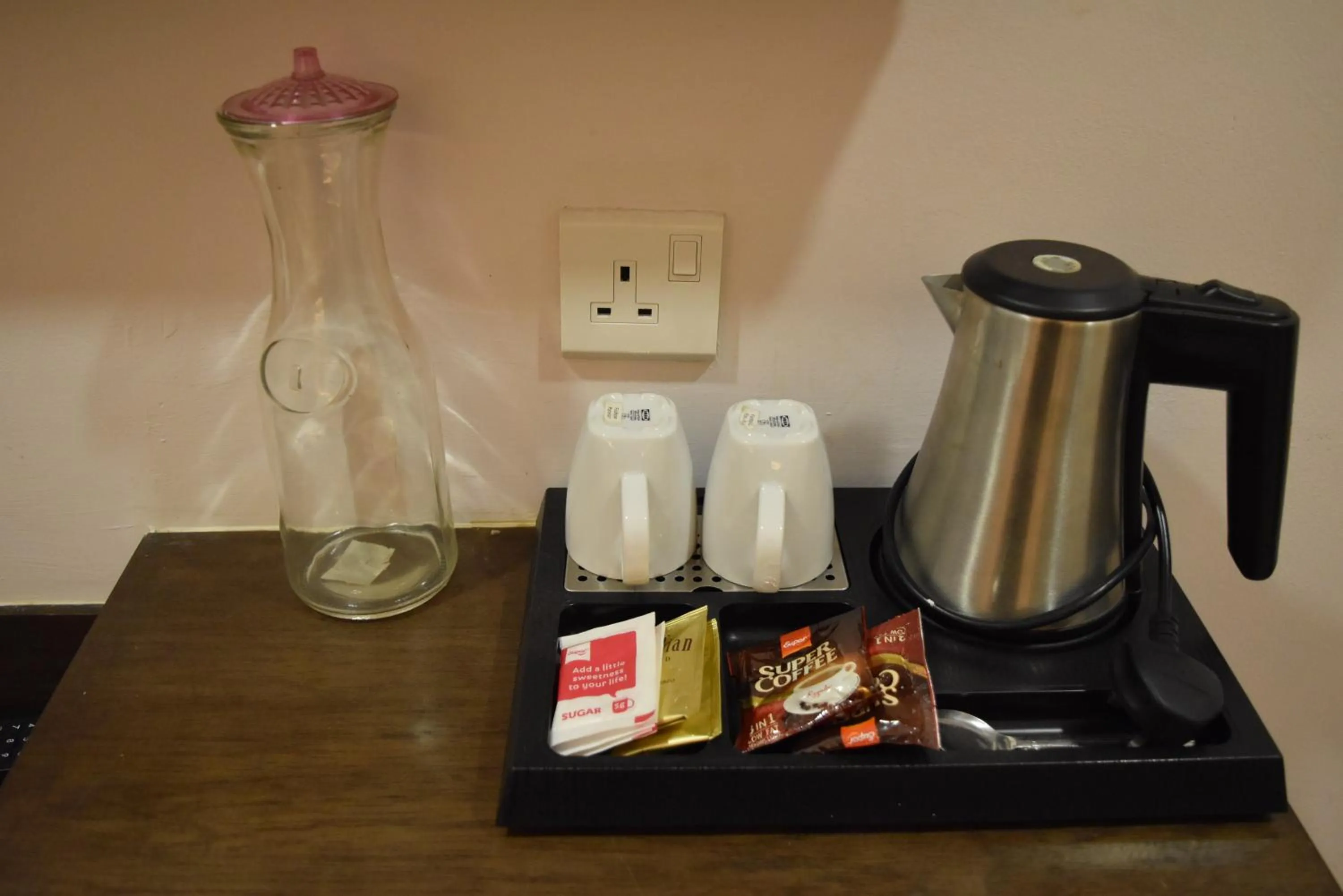 Coffee/tea facilities in Sunrise Hotel