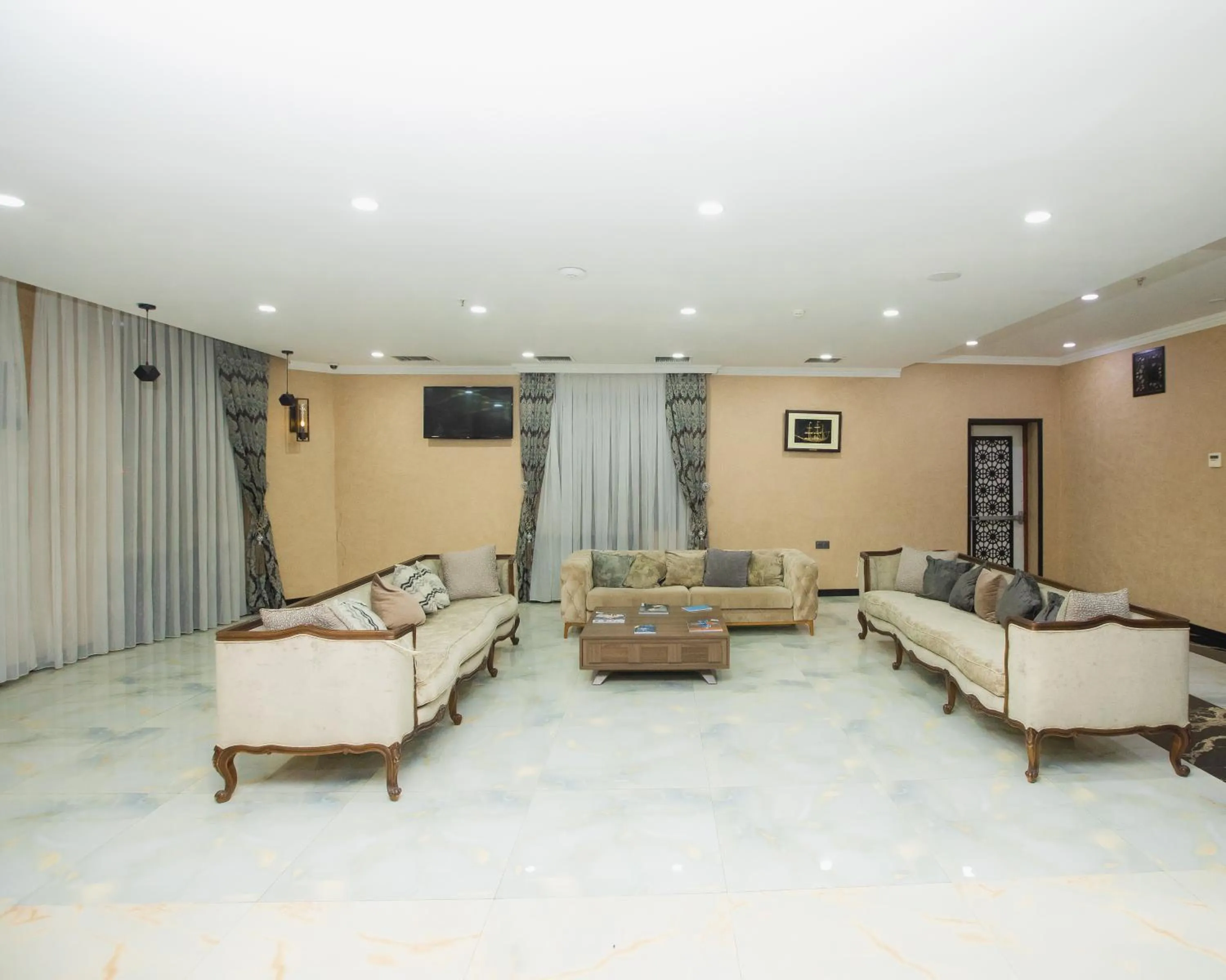 Bed in Corniche White City Hotel