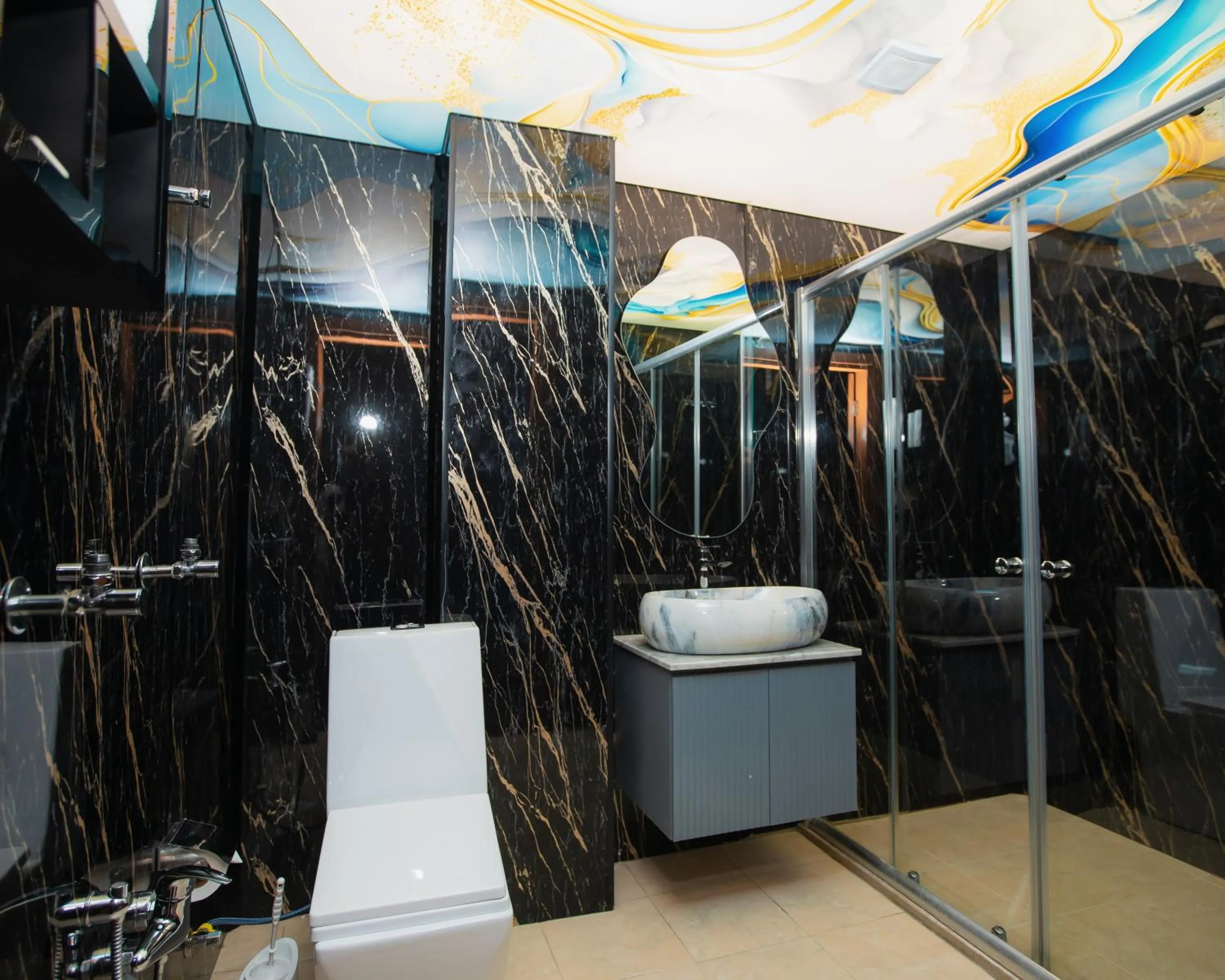 Shower in Corniche White City Hotel