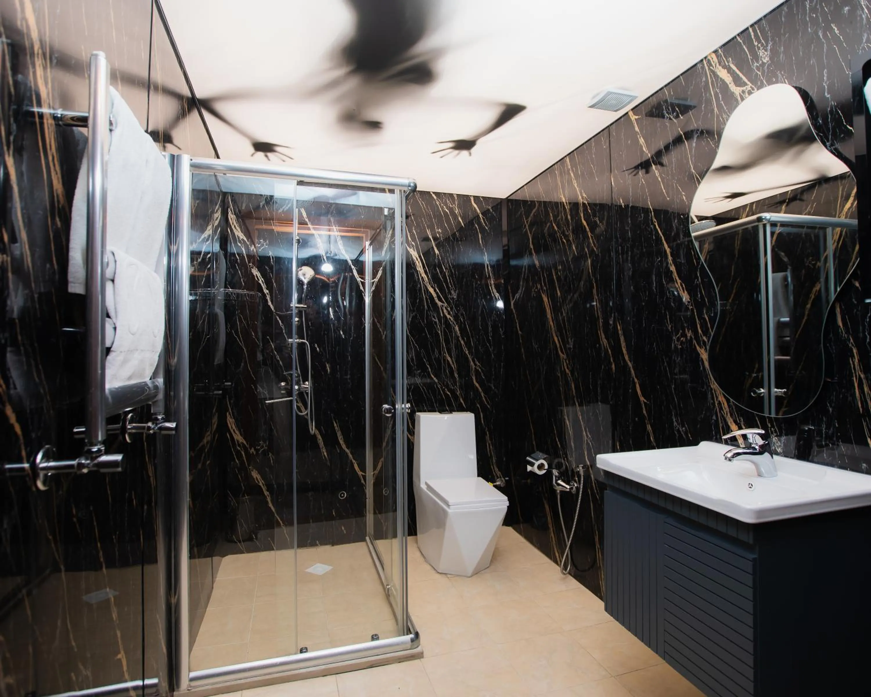 Shower in Corniche White City Hotel