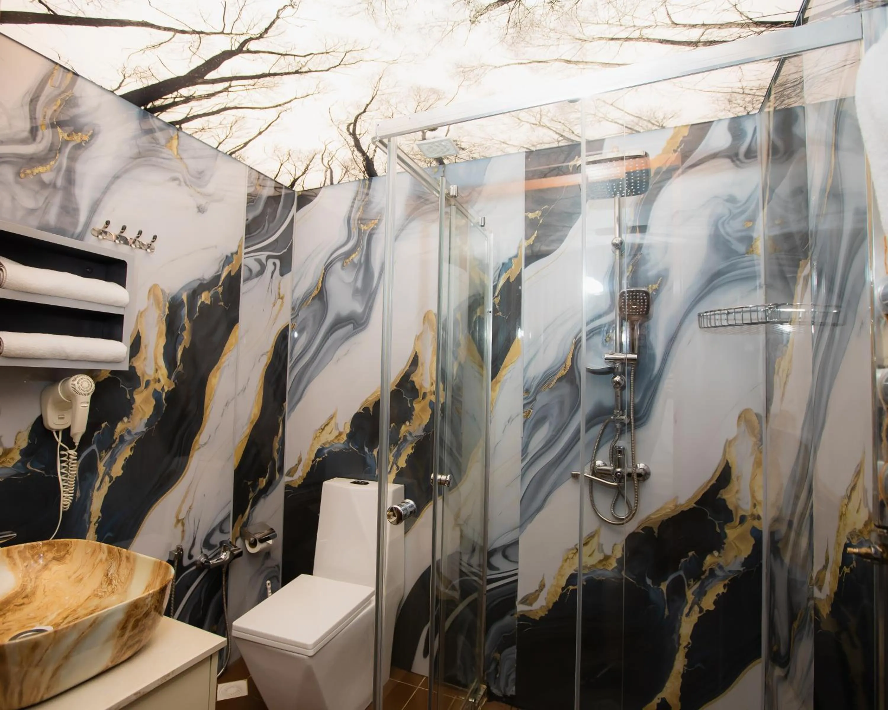 Shower in Corniche White City Hotel