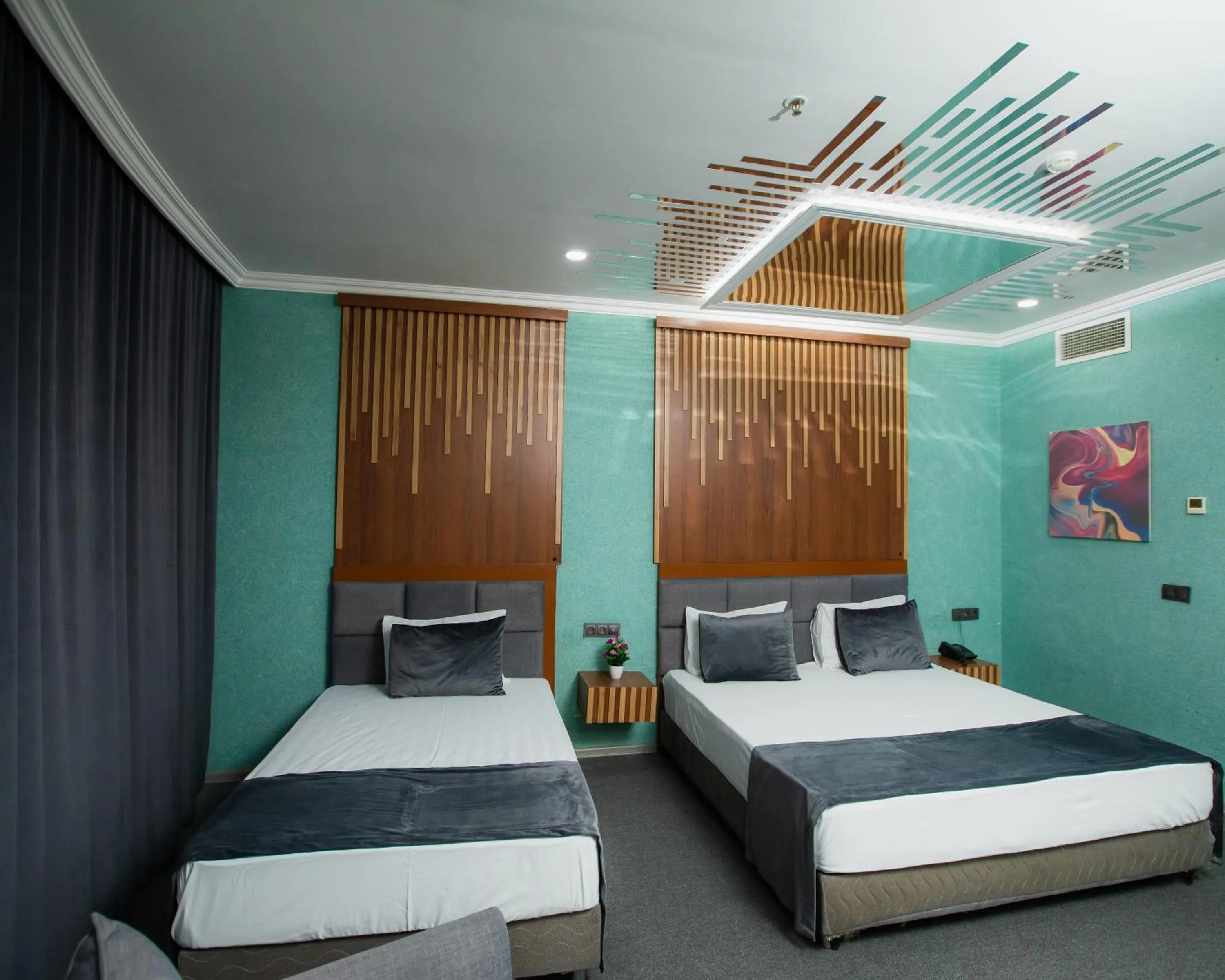 Bed in Corniche White City Hotel