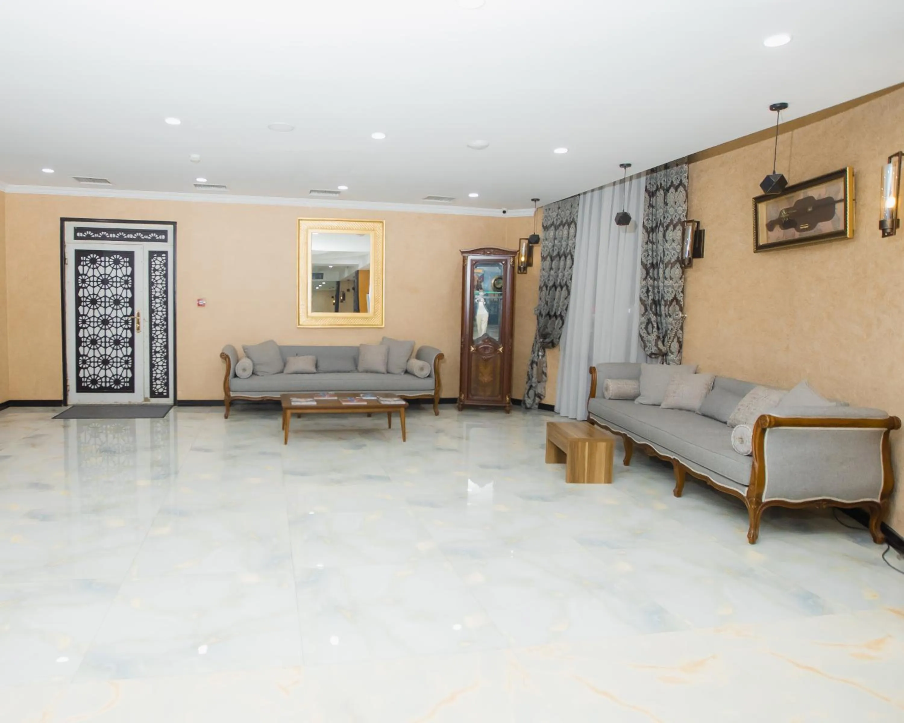 Living room in Corniche White City Hotel