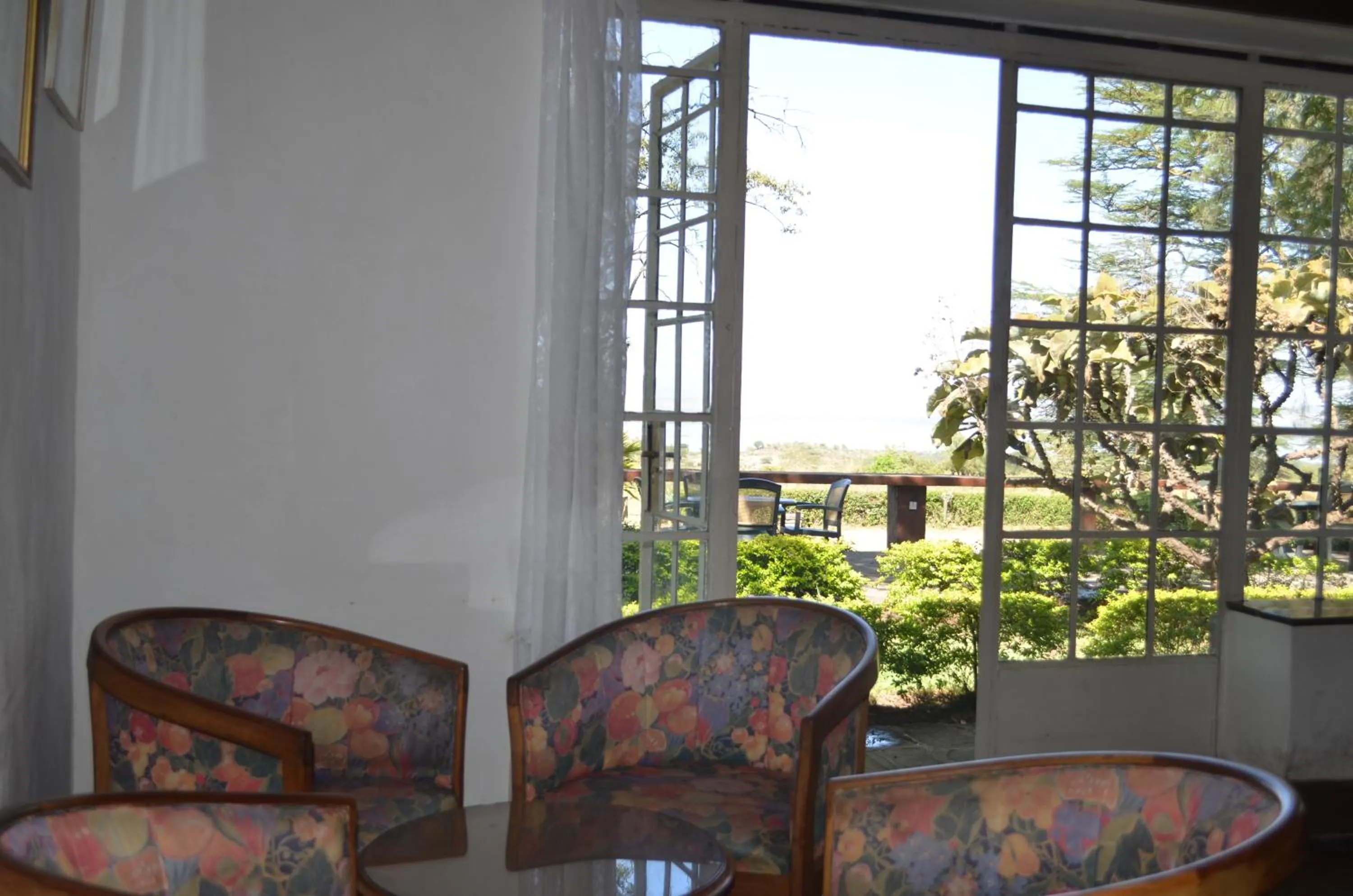 Lounge or bar in Jacaranda Lake Elementaita Lodge