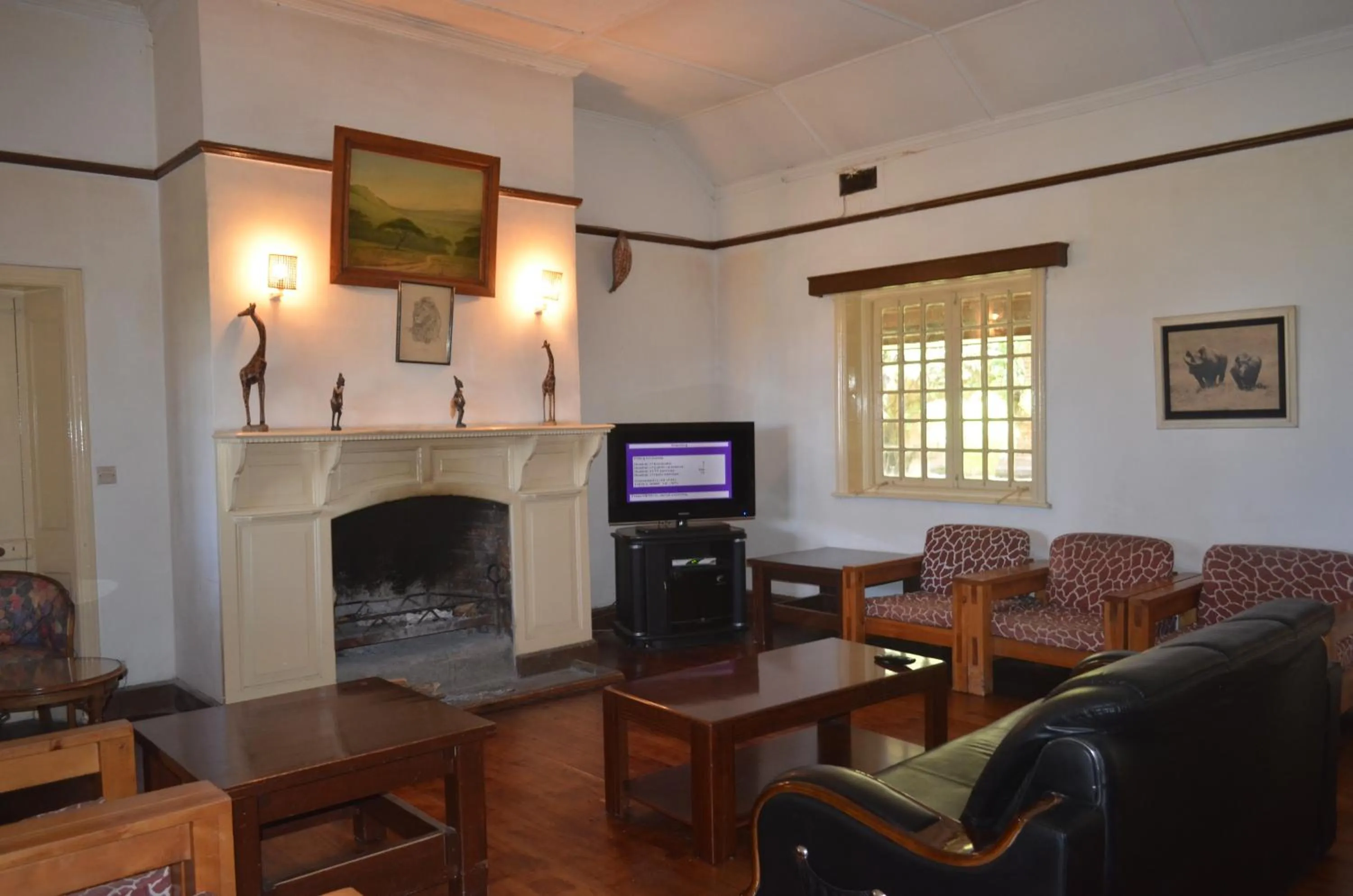 Lounge or bar in Jacaranda Lake Elementaita Lodge