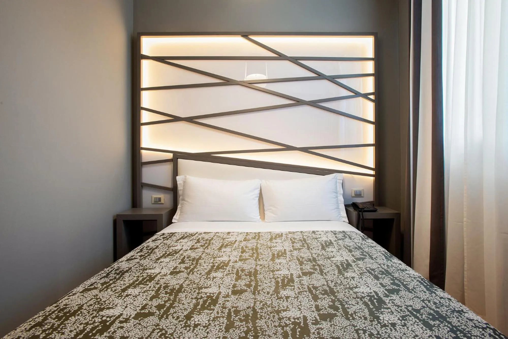 Bed in Fortyfive Squared Hotel