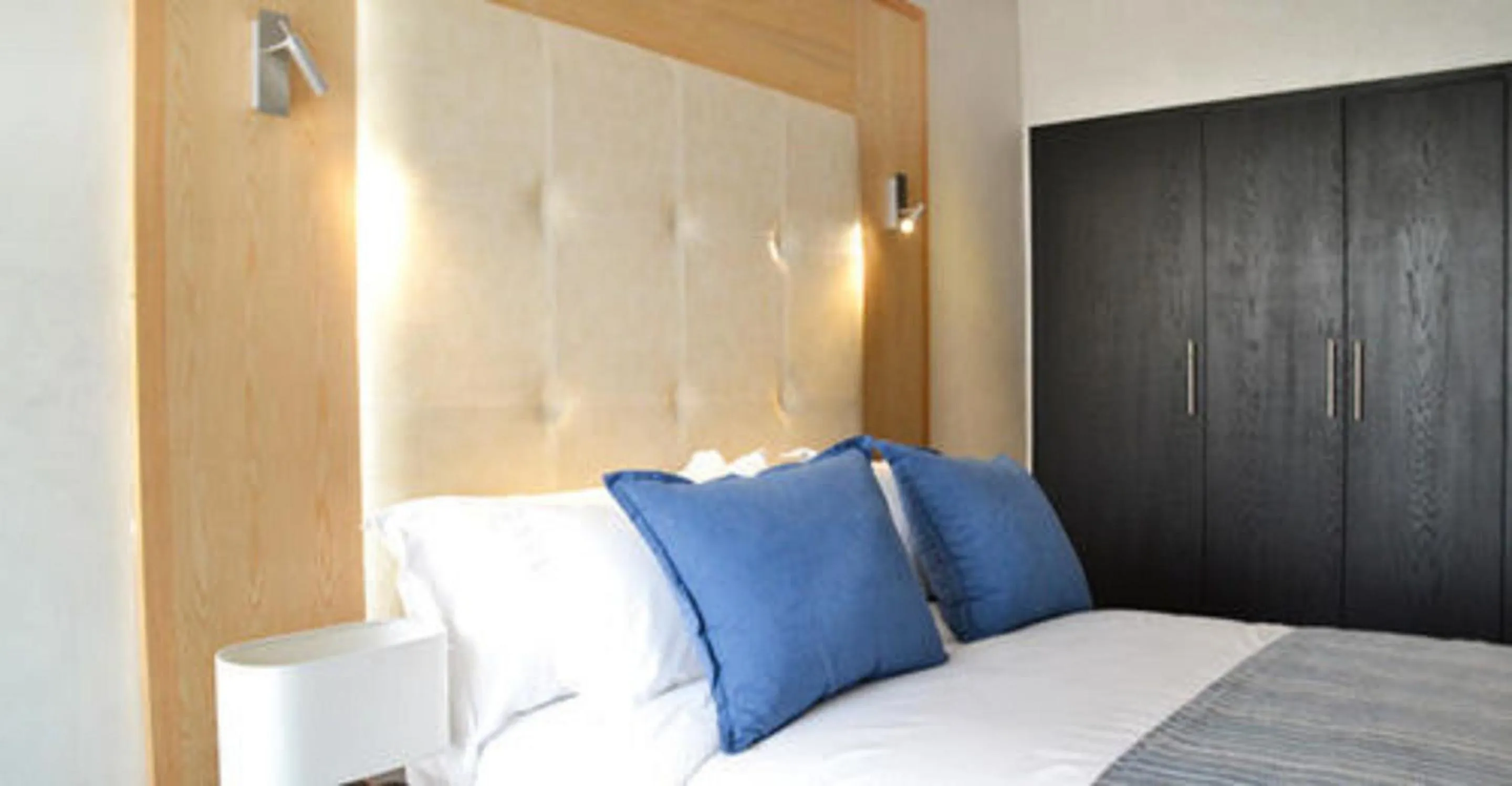 Bed in Le 135 appart hotel